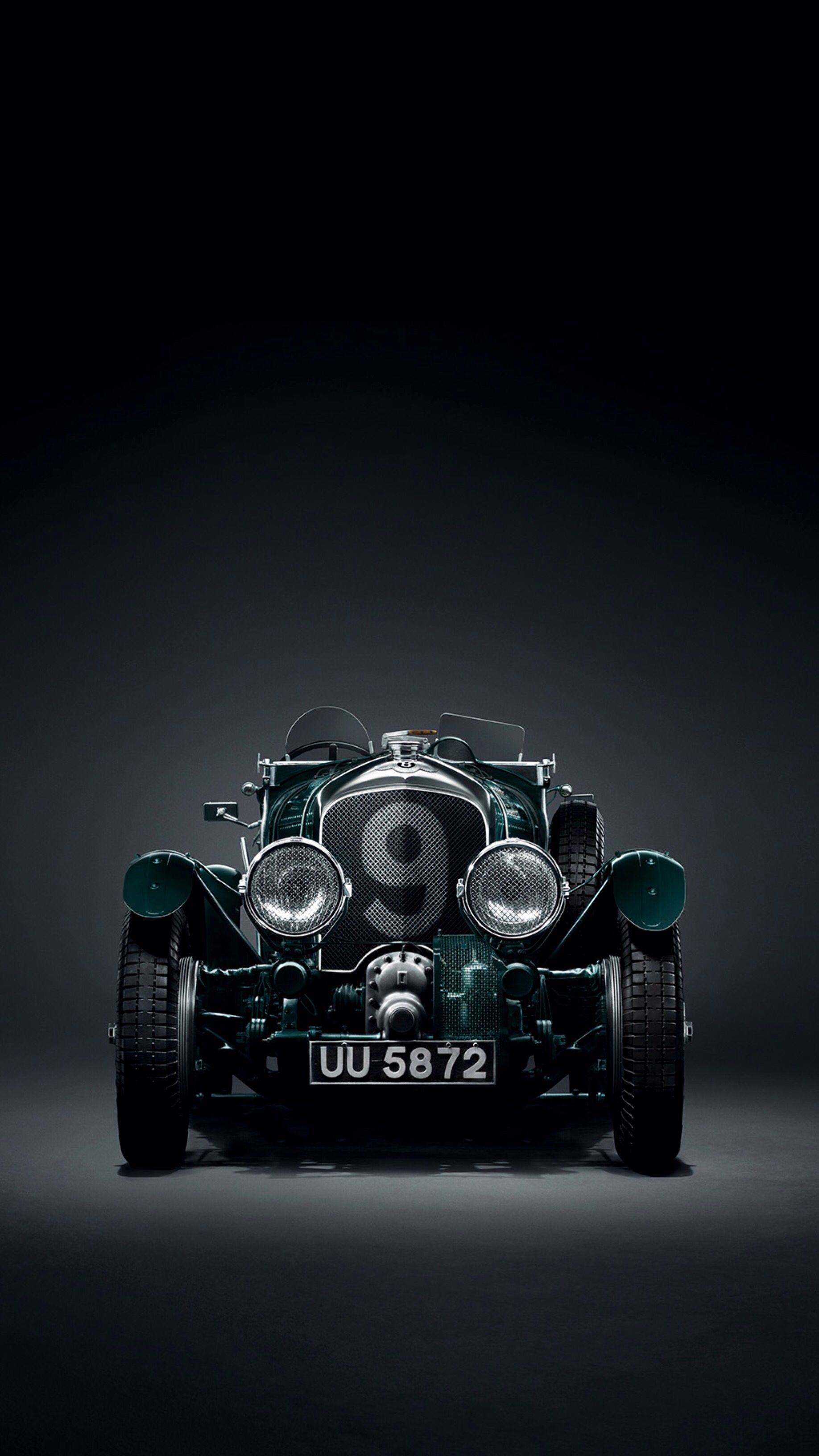 Vintage Car: Dashboard designs focuses on essential gauges and controls. 1840x3270 HD Background.