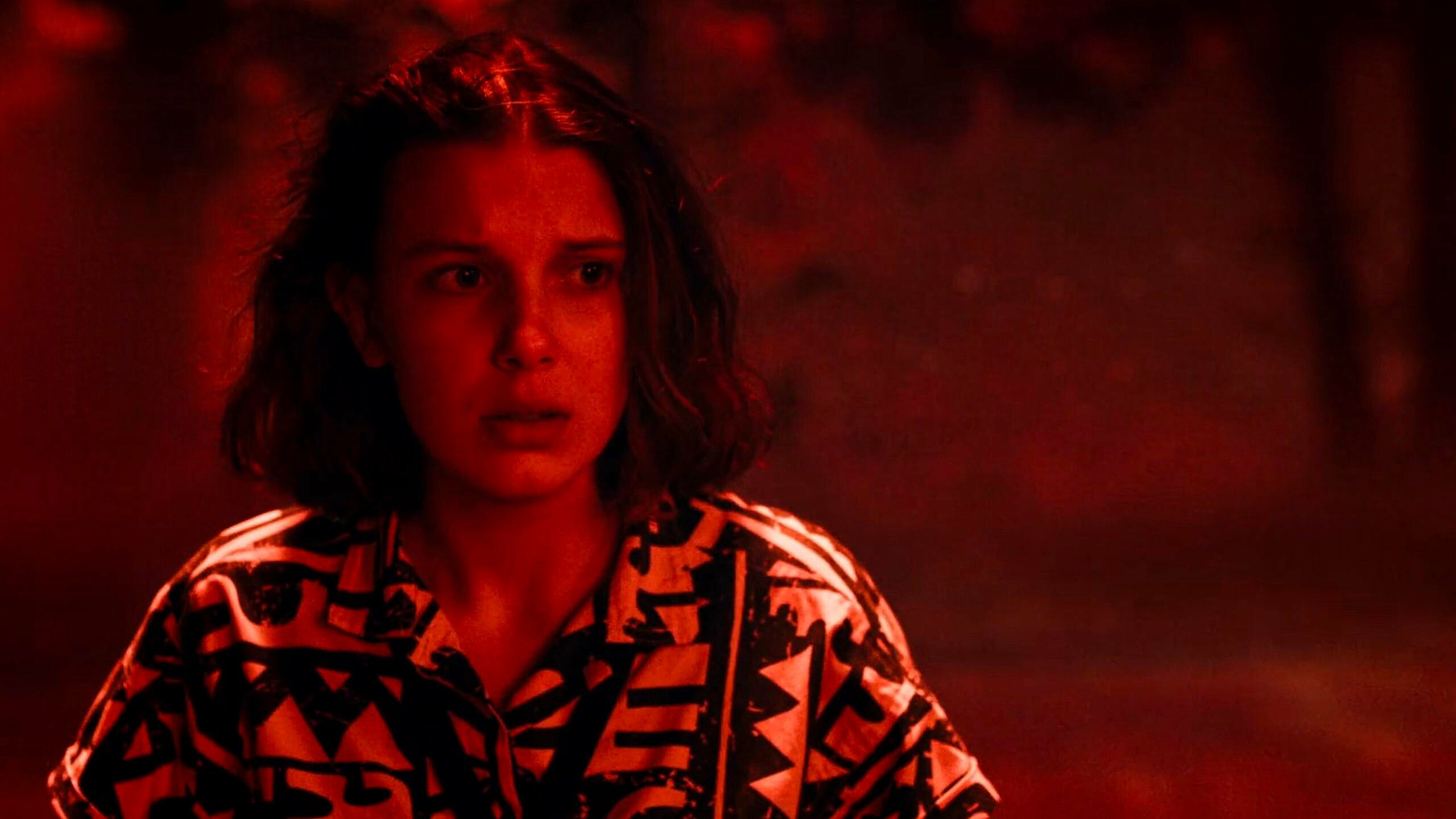 Stranger Things: Eleven, portrayed by British actress Millie Bobby Brown. 2560x1440 HD Wallpaper.