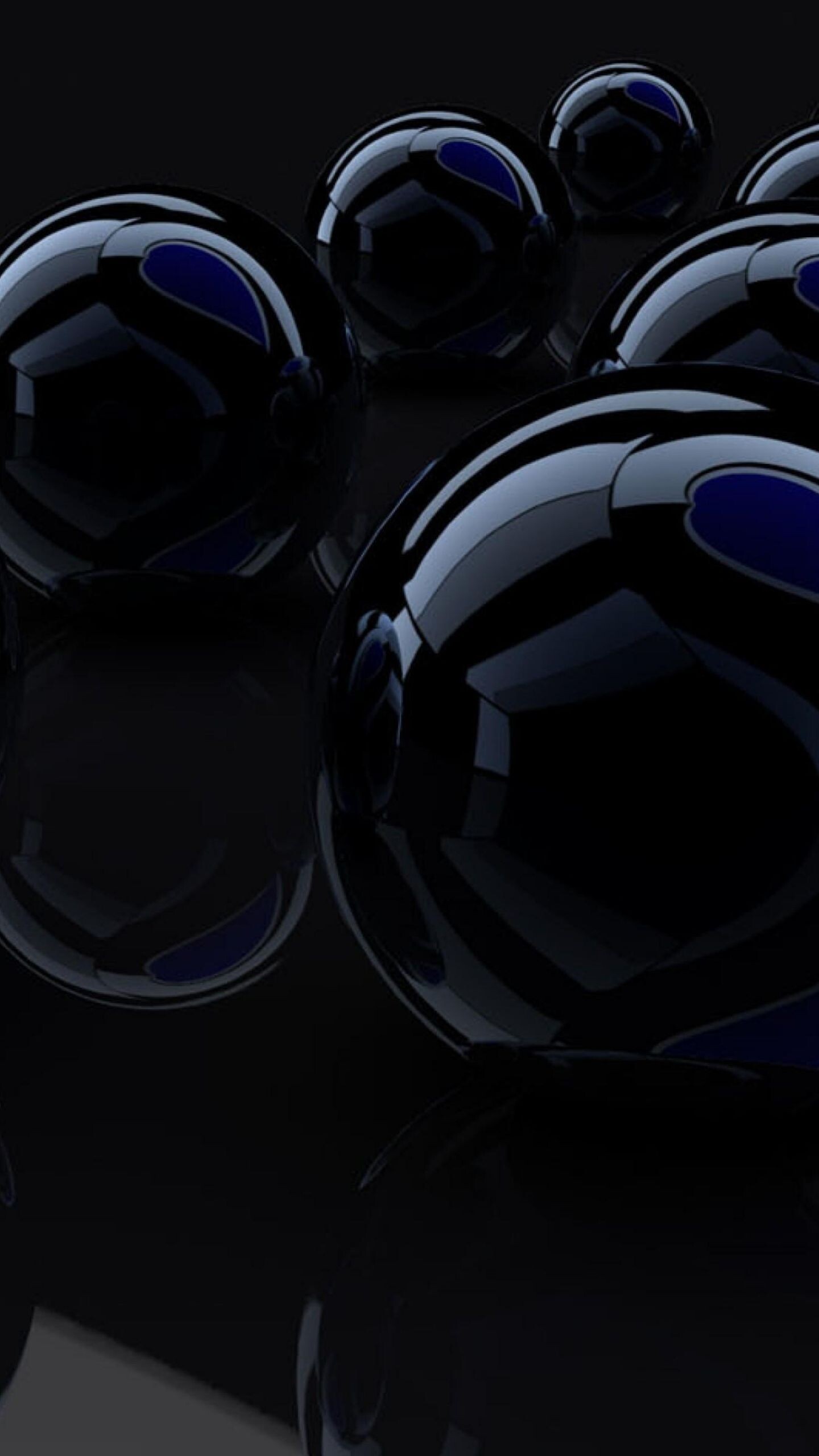 Glass: Black spheres, An amorphous material formed from a melt by cooling to rigidity. 1440x2560 HD Background.