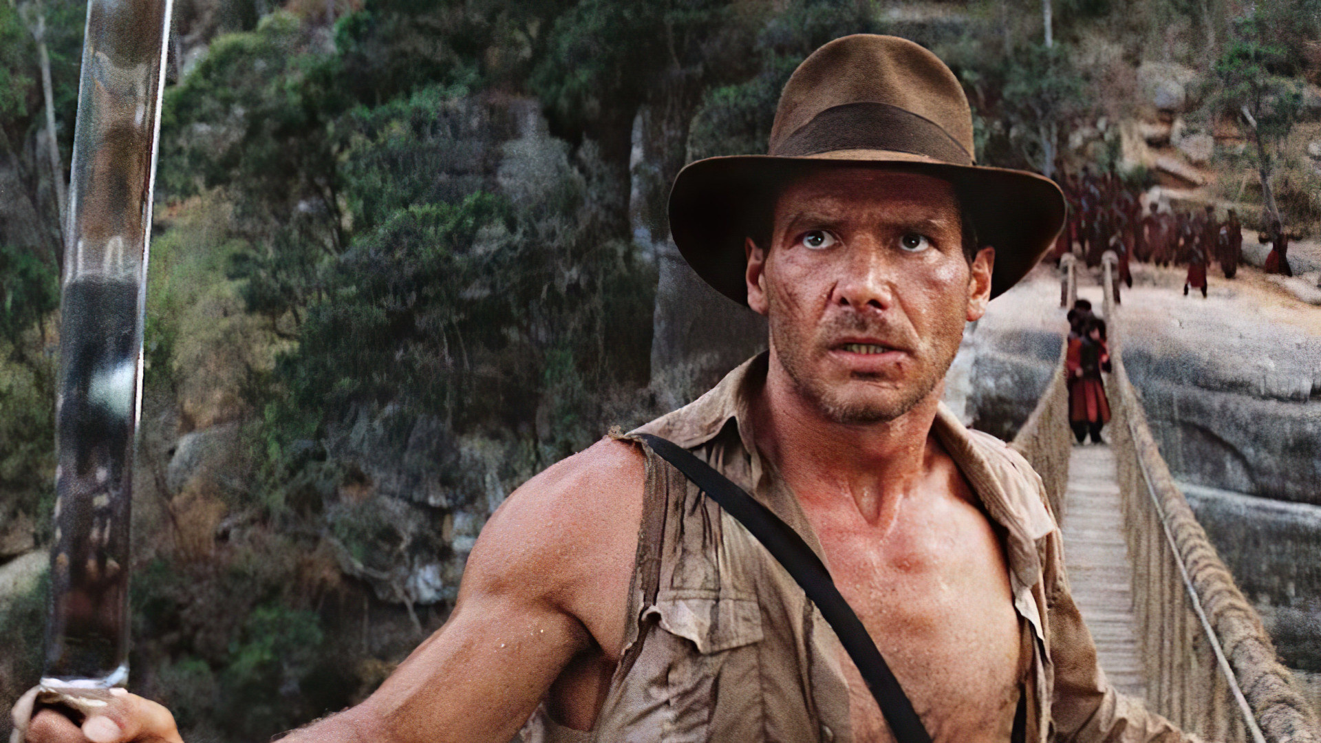 Harrison Ford (Indiana Jones): Ford's character in a series of successful adventure films directed by Steven Spielberg. 1920x1080 Full HD Background.