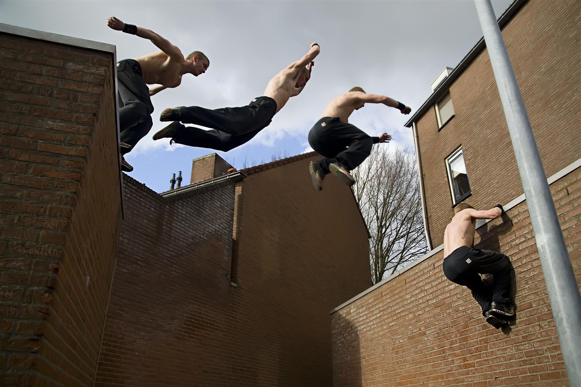 Parkour: Wall run and arm jump, Main movements, Athletic discipline. 2000x1340 HD Background.