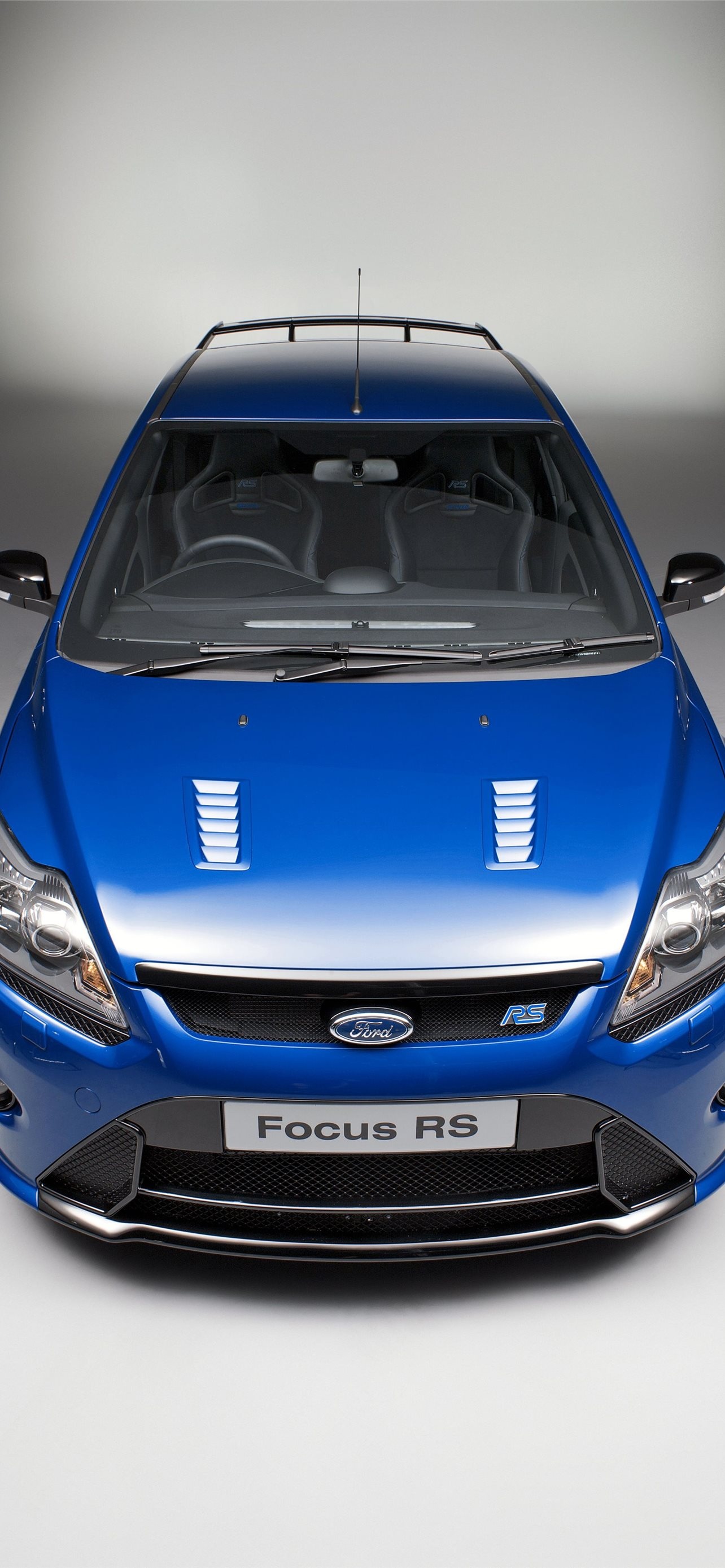 Ford Focus: The car was officially revealed at the Geneva Motor Show in March 1998. 1290x2780 HD Background.