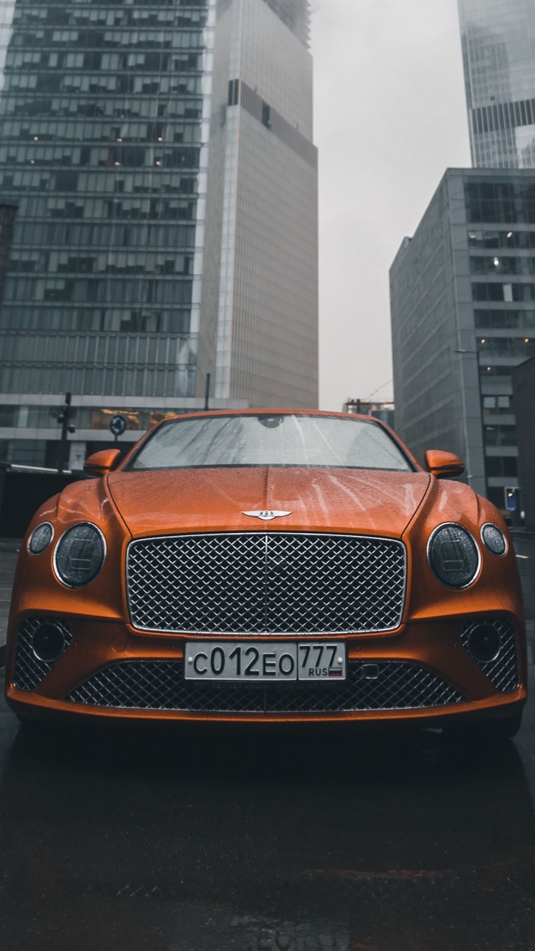Bentley Continental, Luxury car, Orange wallpaper, Auto, 1080x1920 Full HD Phone