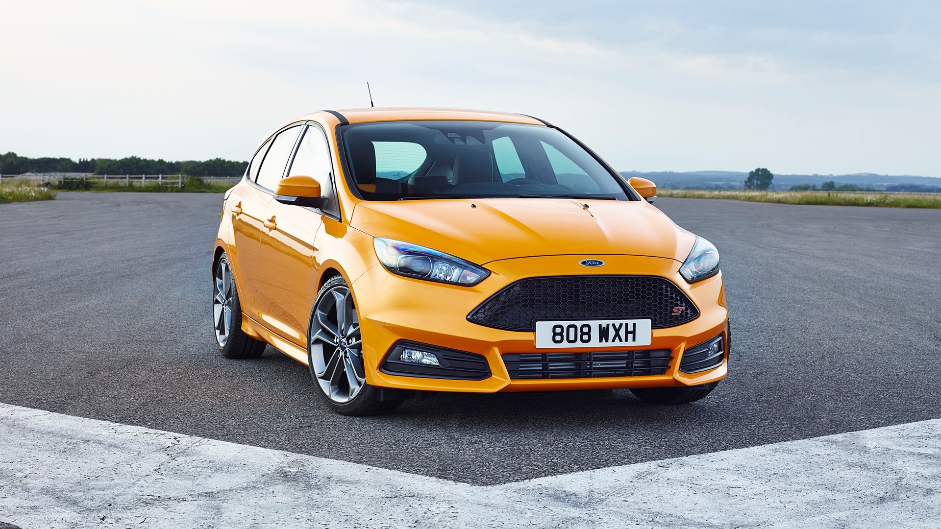 Ford Focus: The Mk III facelifted model was previewed at the 2014 Geneva Motor Show. 1920x1080 Full HD Background.
