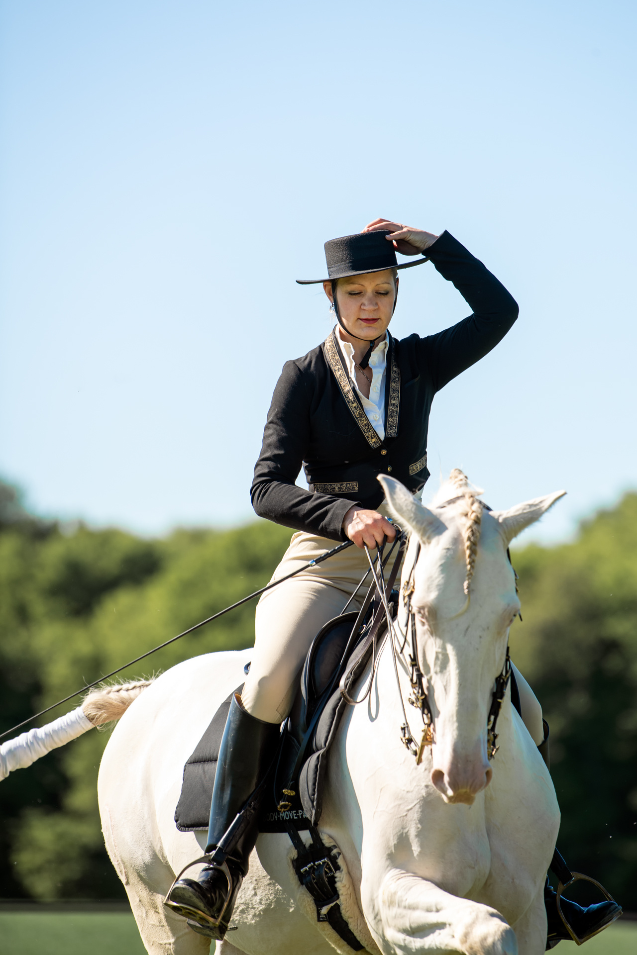 Equitation: Recreational saddle seat activity performed by a female rider, Equestrian sport. 1280x1920 HD Background.