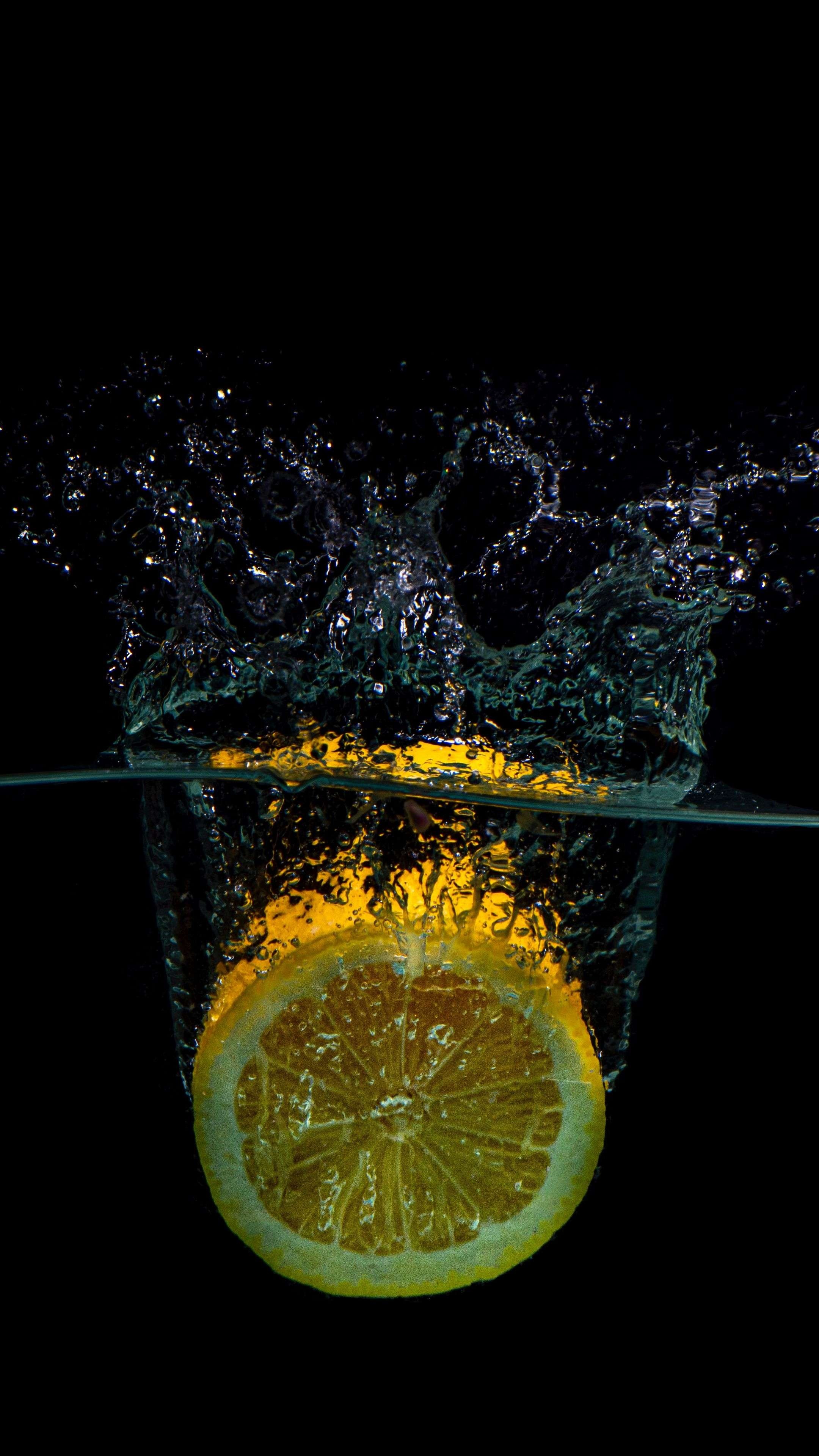 Lemon: The distinctive sour taste, A key ingredient in drinks. 2160x3840 4K Background.