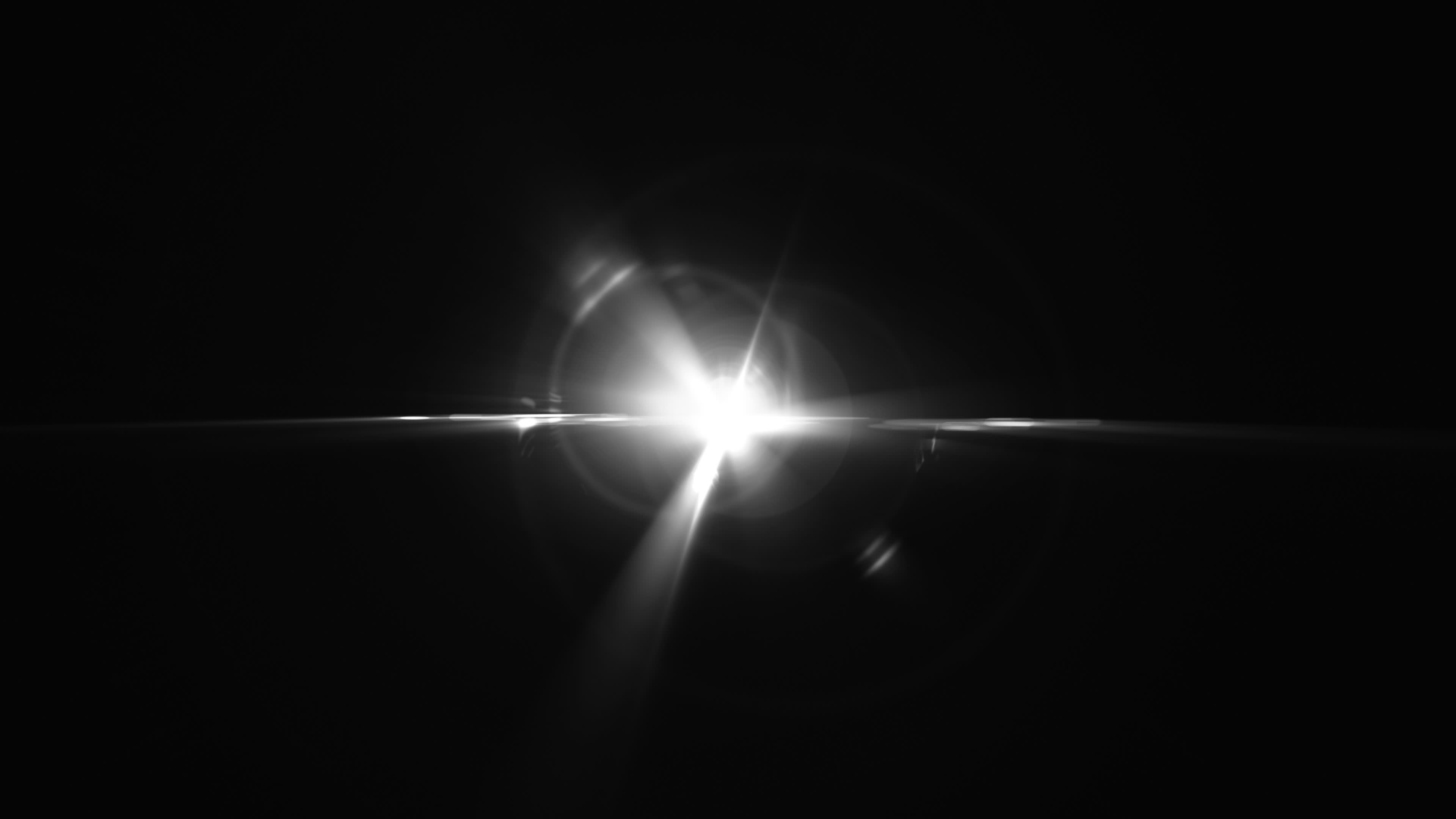Black and white optical lens flares, Looping footage, 3840x2160 4K Desktop