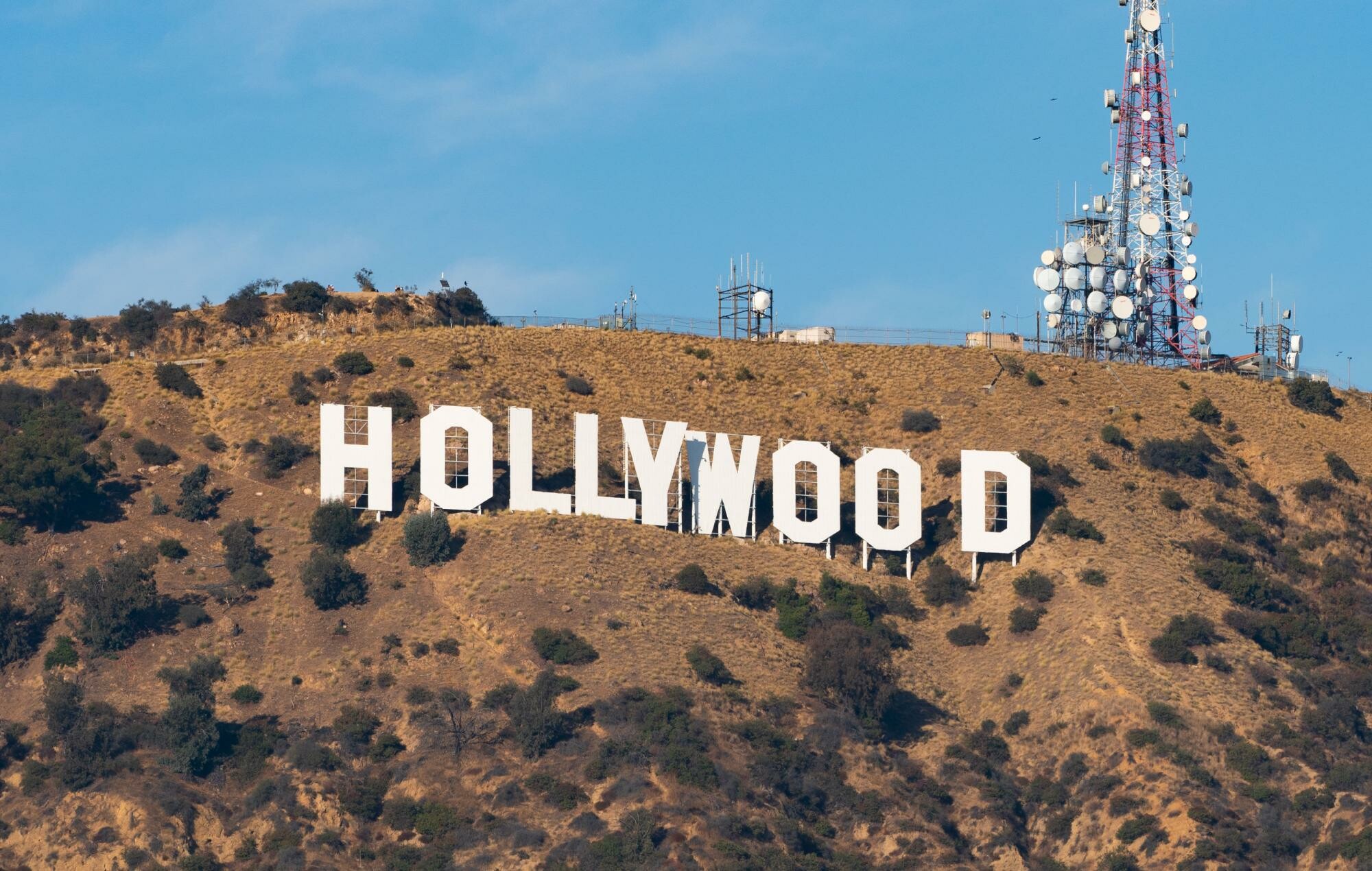 Hollywood Sign: Built by Los Angeles Times publisher Harry Chandler as an epic $21,000 billboard. 2000x1270 HD Background.