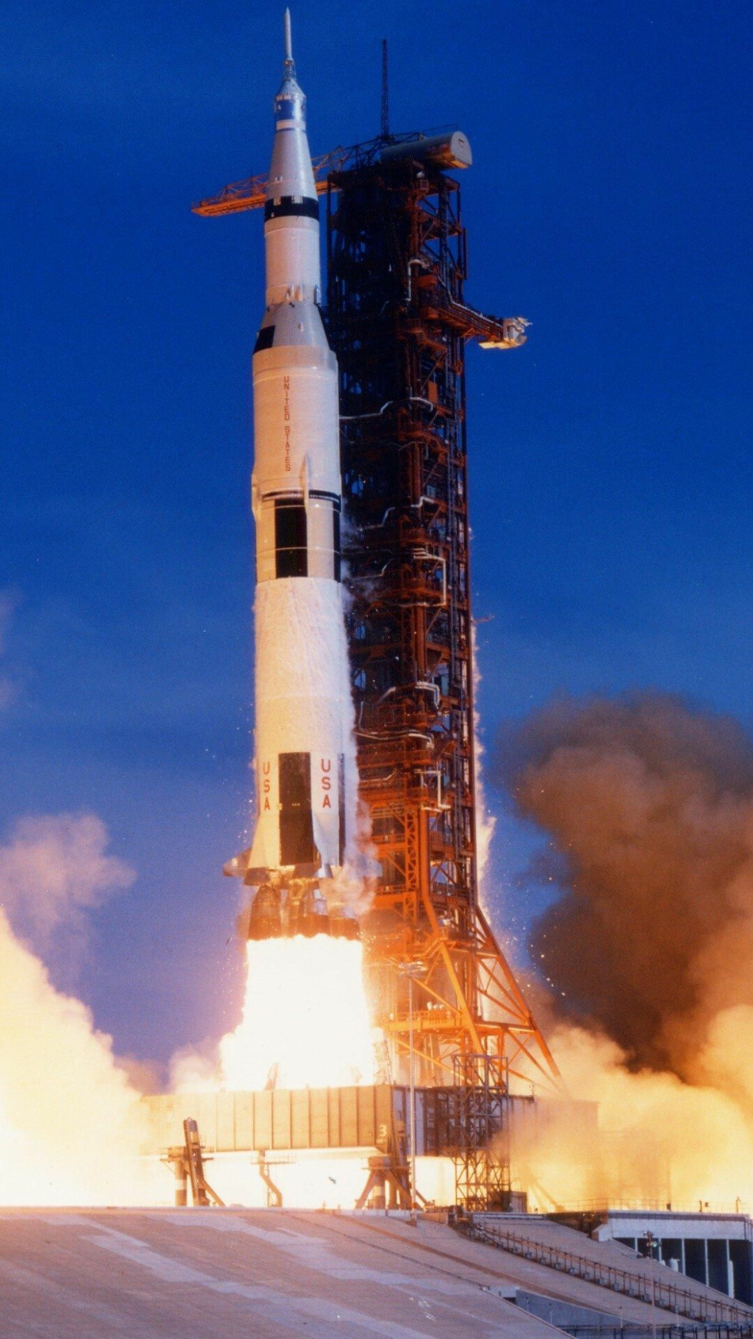 Apollo 11: A crewed spacecraft launched by a Saturn V rocket from Kennedy Space Center, 1969. 1080x1920 Full HD Background.