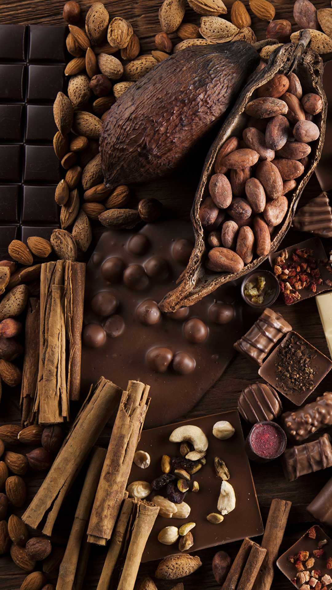 Chocolate: The fruit of the cacao, the seeds of an evergreen tree in the family Malvaceae. 1080x1920 Full HD Wallpaper.