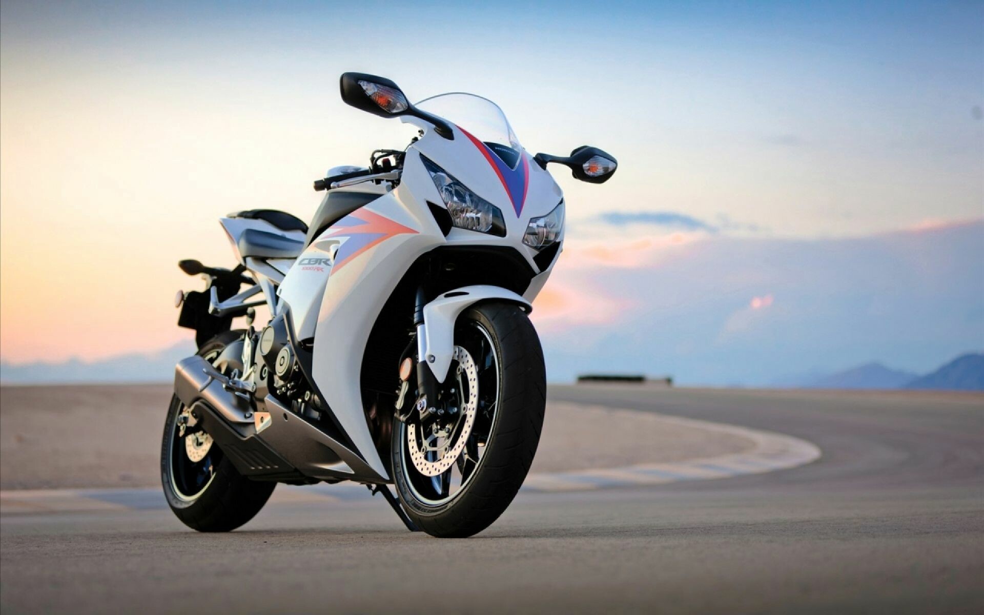 Bike: Honda CBR1000RR, A 999 cc (61.0 cu in) liquid-cooled inline four-cylinder superbike. 1920x1200 HD Background.