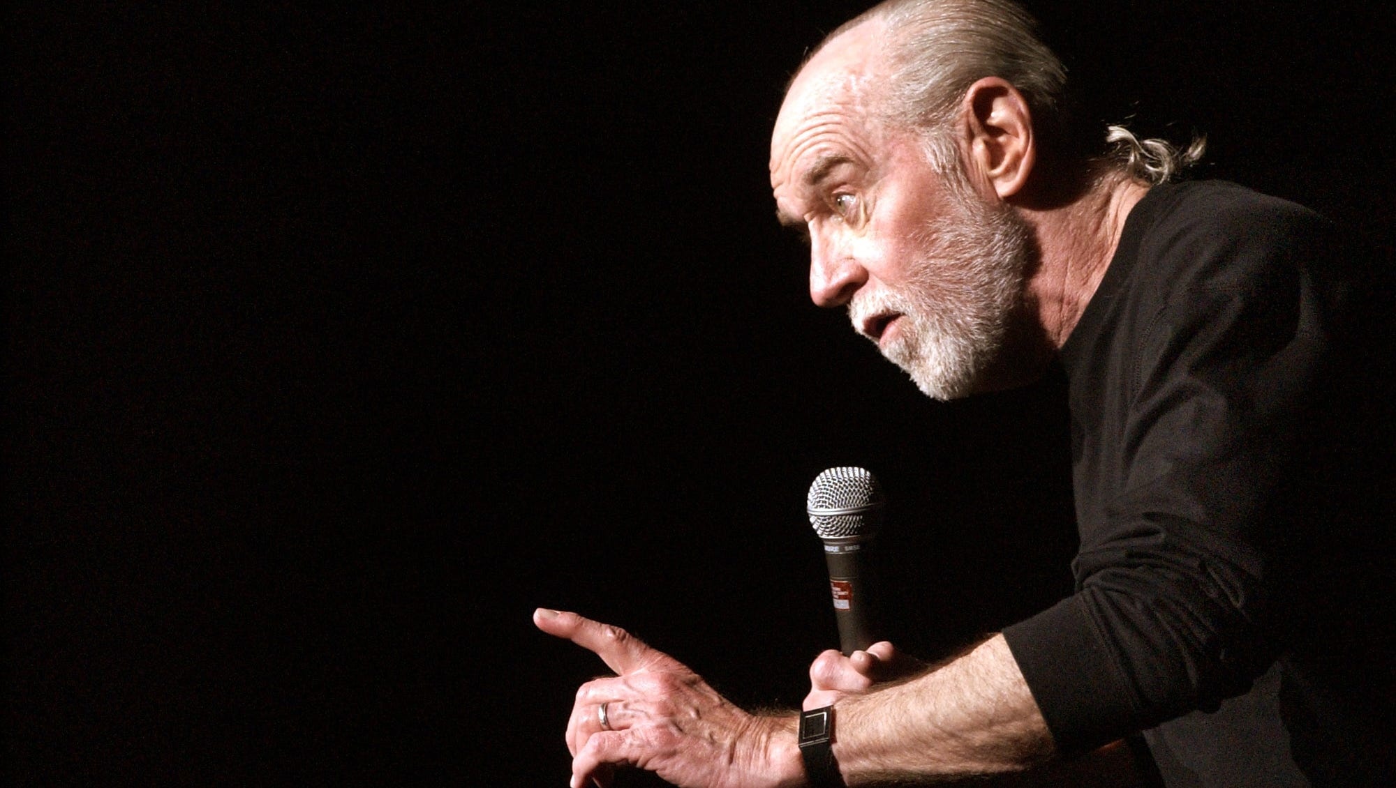 George Carlin: The first of 14 stand-up comedy specials for HBO was filmed in 1977. 2000x1130 HD Wallpaper.