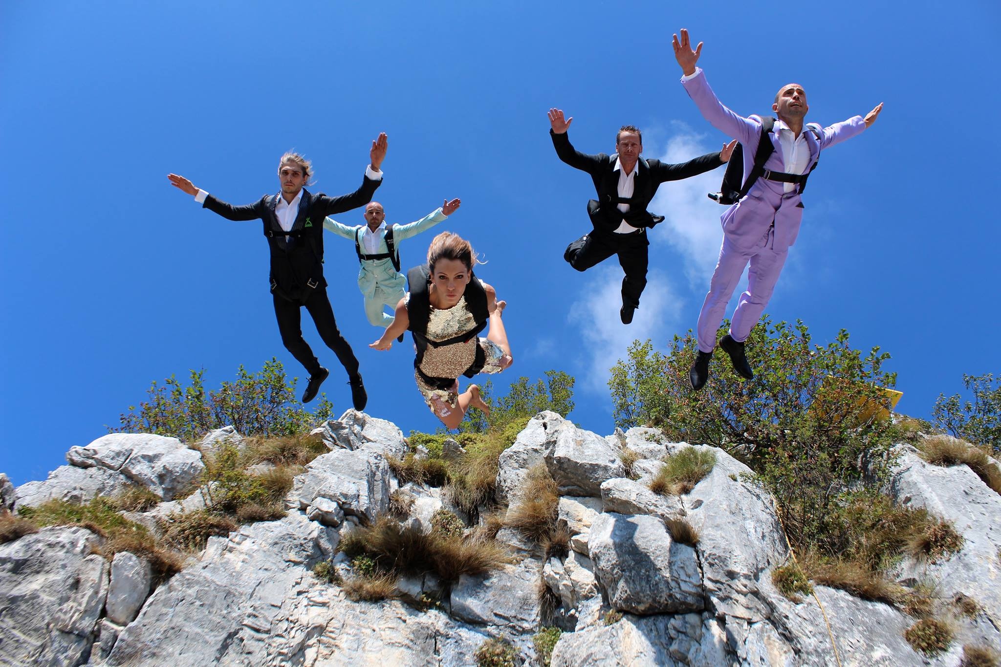 BASE Jumping: Group jump from a cliff, Wrong jumping clothes, Artistry over efficiency. 2050x1370 HD Wallpaper.