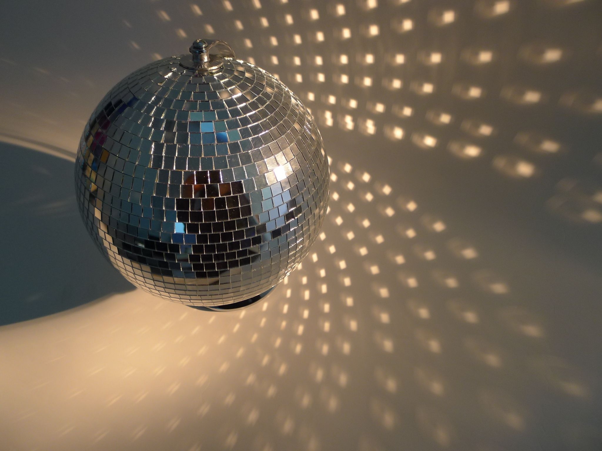 Discotheque: A mirrored surface, Illuminated by spotlights, Beams of light, Party decoration. 2050x1540 HD Wallpaper.