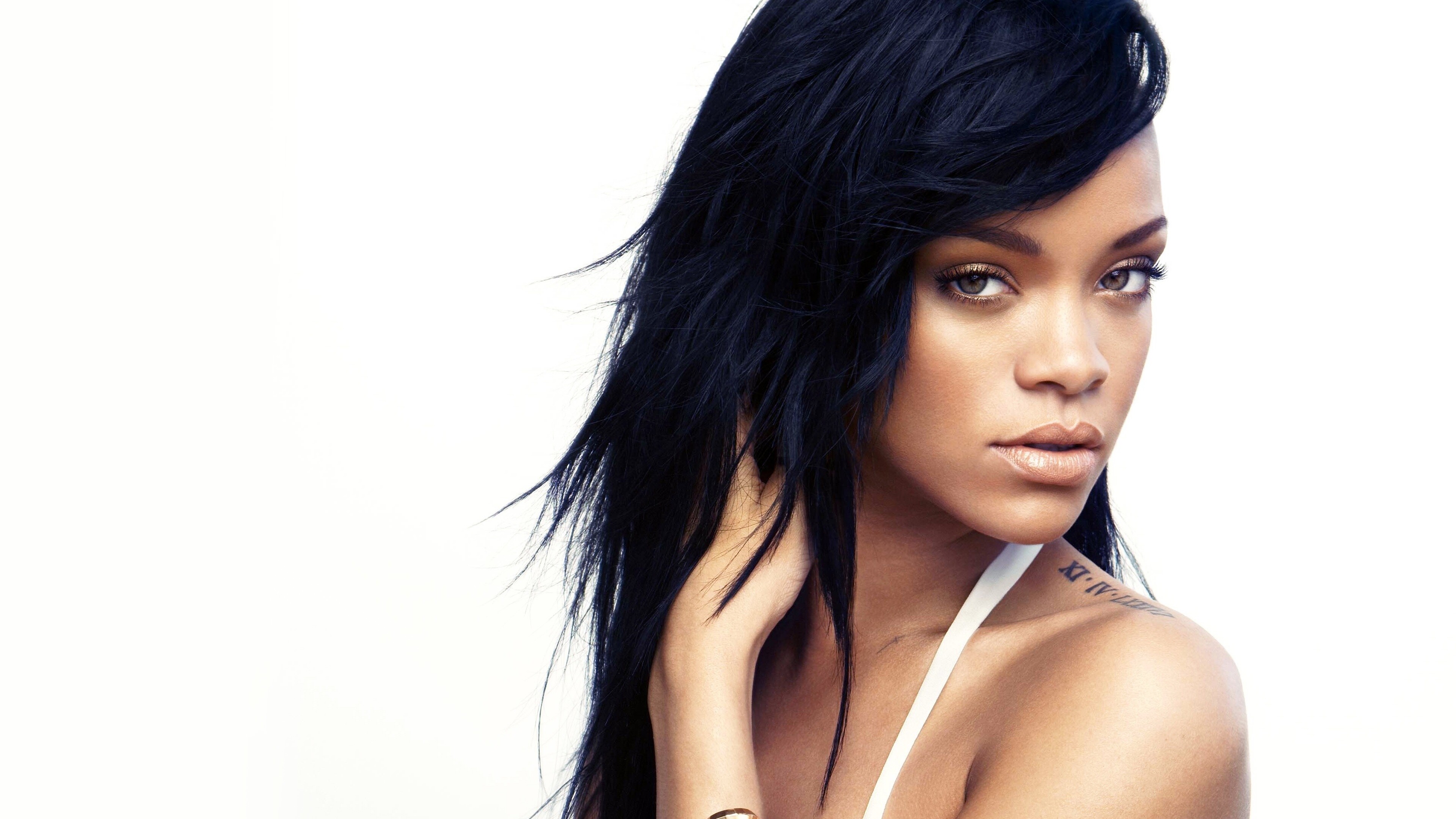 Rihanna: A Barbadian singer, actress, and businesswoman, The chart-topping single “Umbrella”. 3840x2160 4K Background.