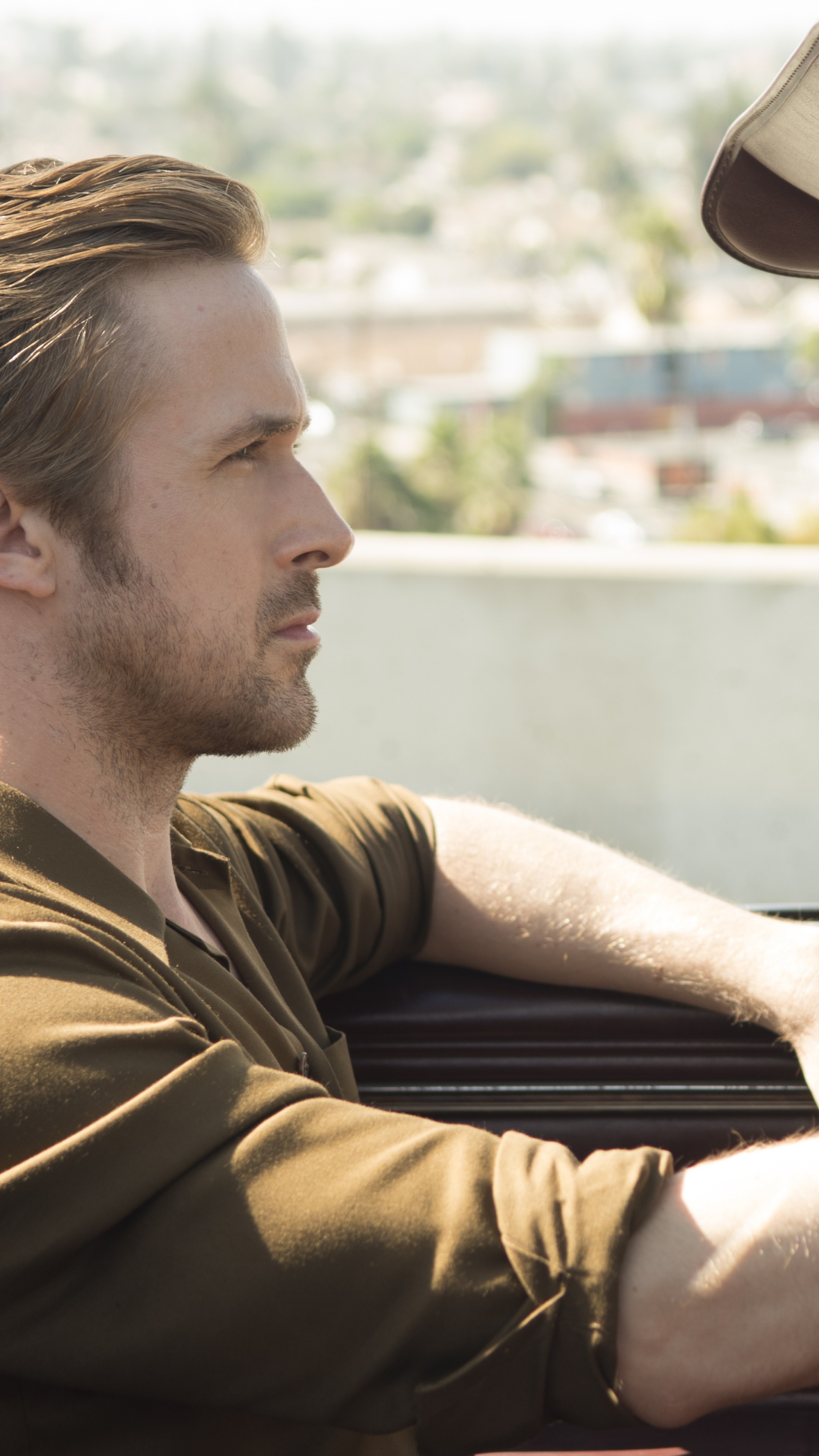 Ryan Gosling: Starred as Sebastian Wilder in a 2016 musical comedy-drama film, La La Land. 2160x3840 4K Background.