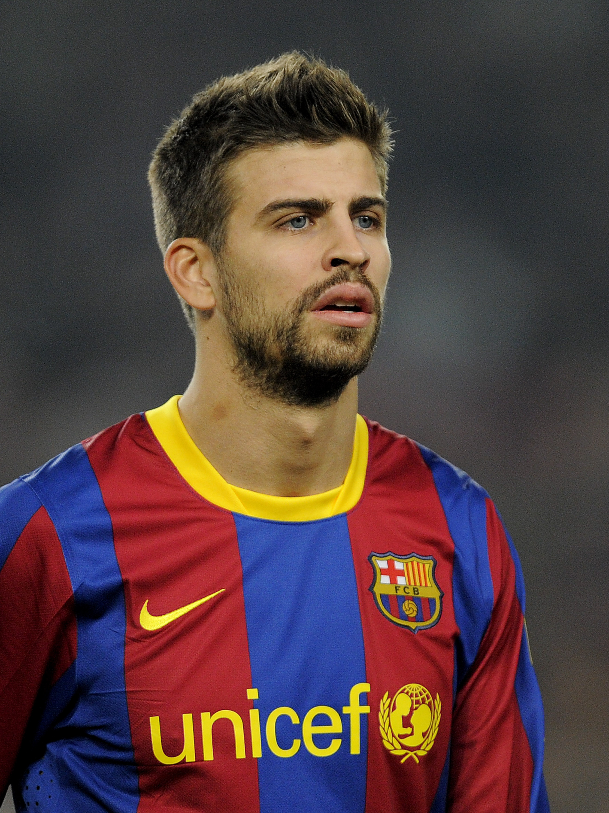 Gerard Pique: Returned to Barcelona in 2008 under Pep Guardiola's leadership and helped the club win trebles in 2008–09 and 2014–15. 2050x2740 HD Background.