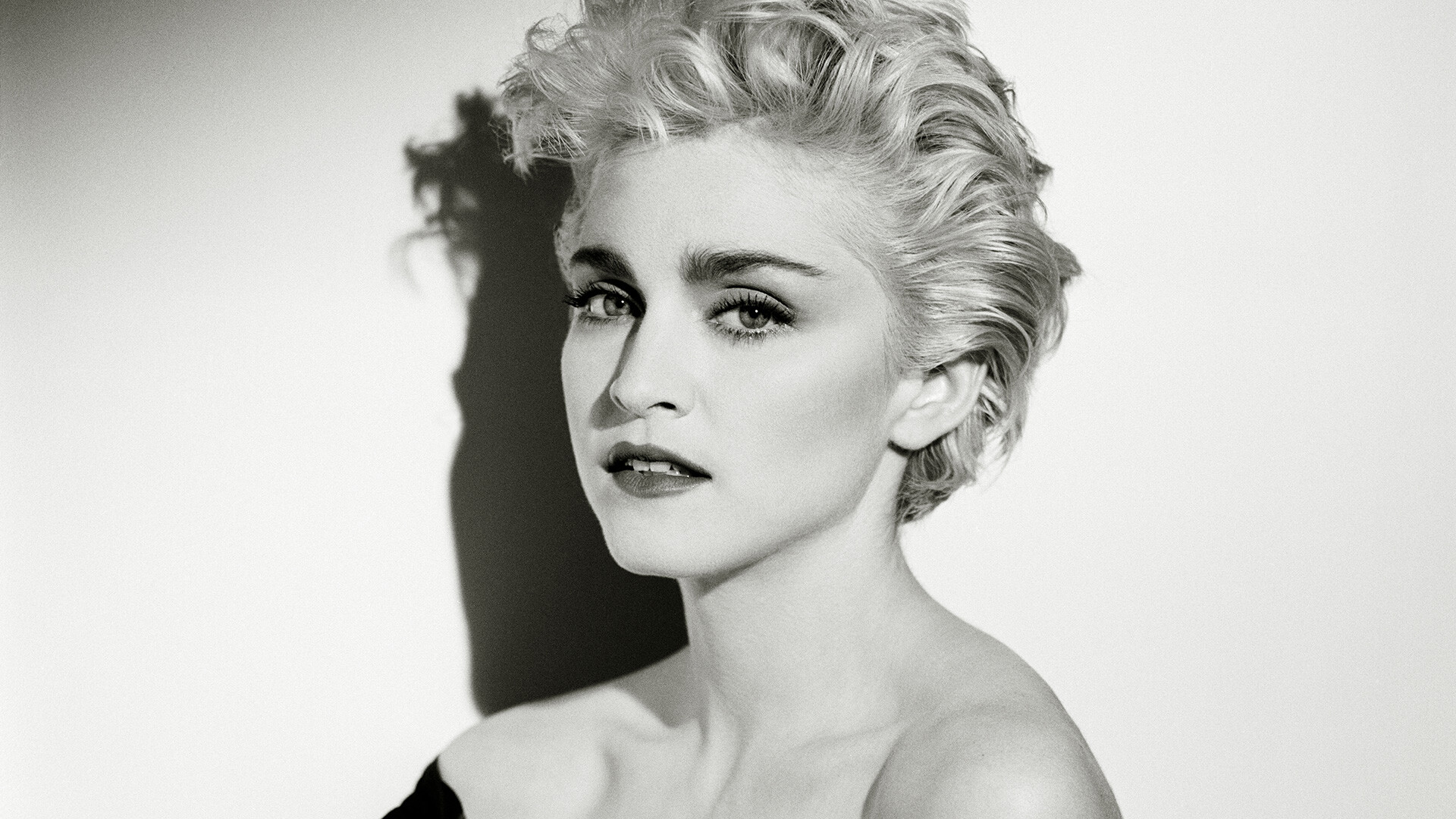 Madonna: An American entertainer who was born in Bay City, Michigan and raised in the Michigan suburbs of Pontiac and Avon Township. 1920x1080 Full HD Background.