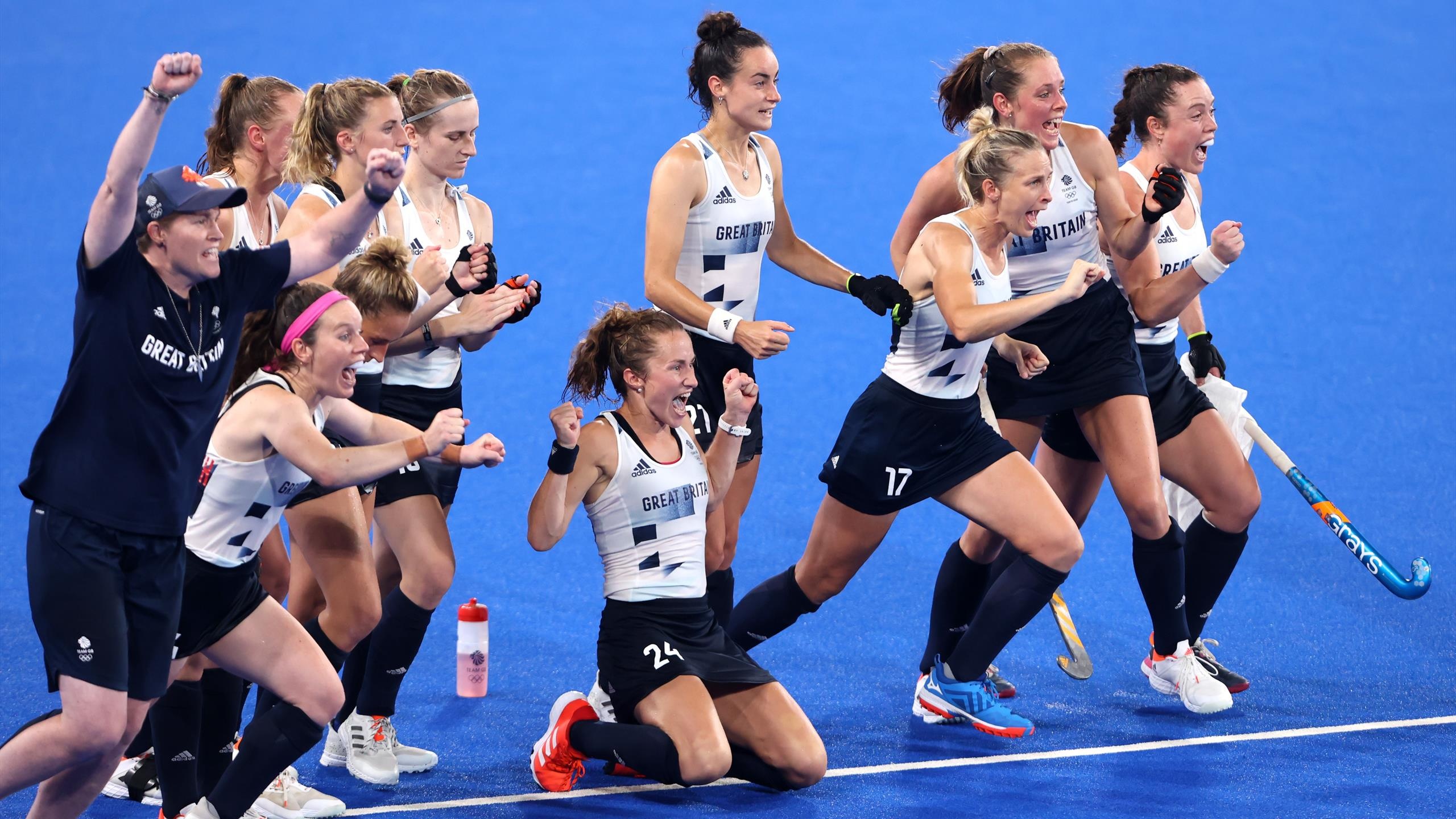Field Hockey: The Great Britain women's national team celebrates the bronze medal at the 2020 Tokyo Summer Olympics. 2560x1440 HD Wallpaper.