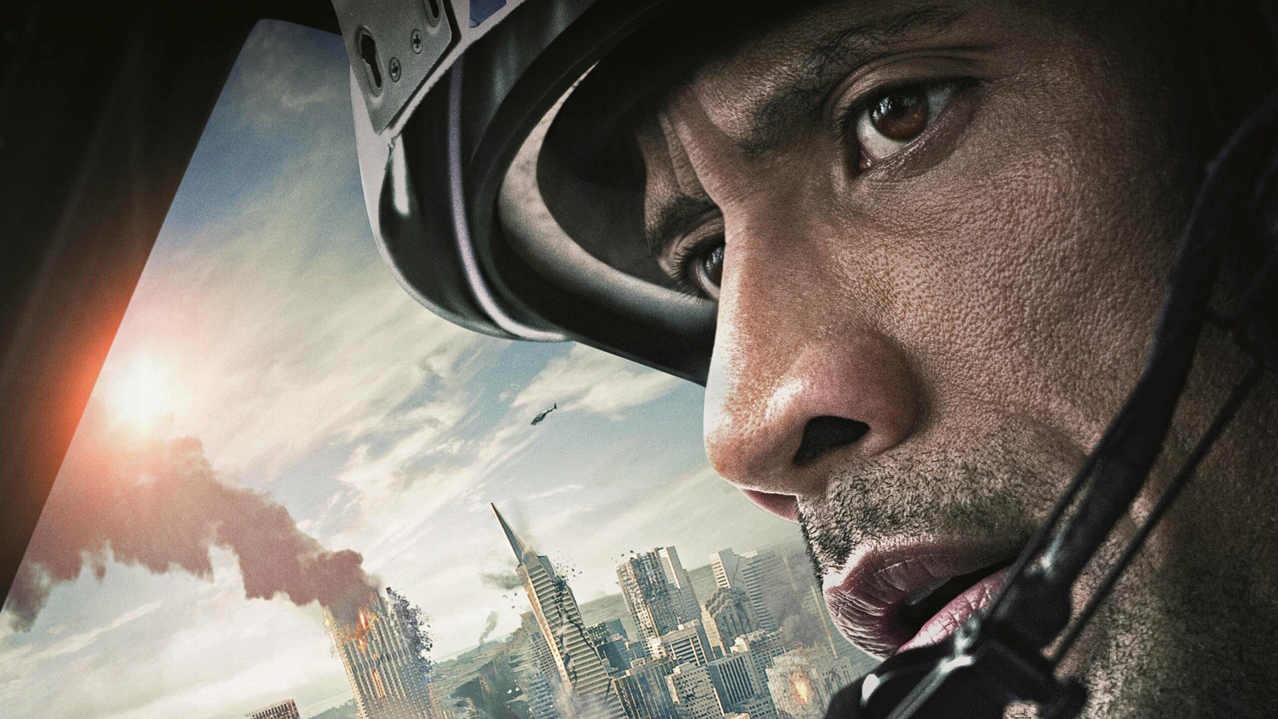 Dwayne Johnson: Took part of Raymond Gaines in a 2015 American disaster film, San Andreas. 2560x1440 HD Wallpaper.