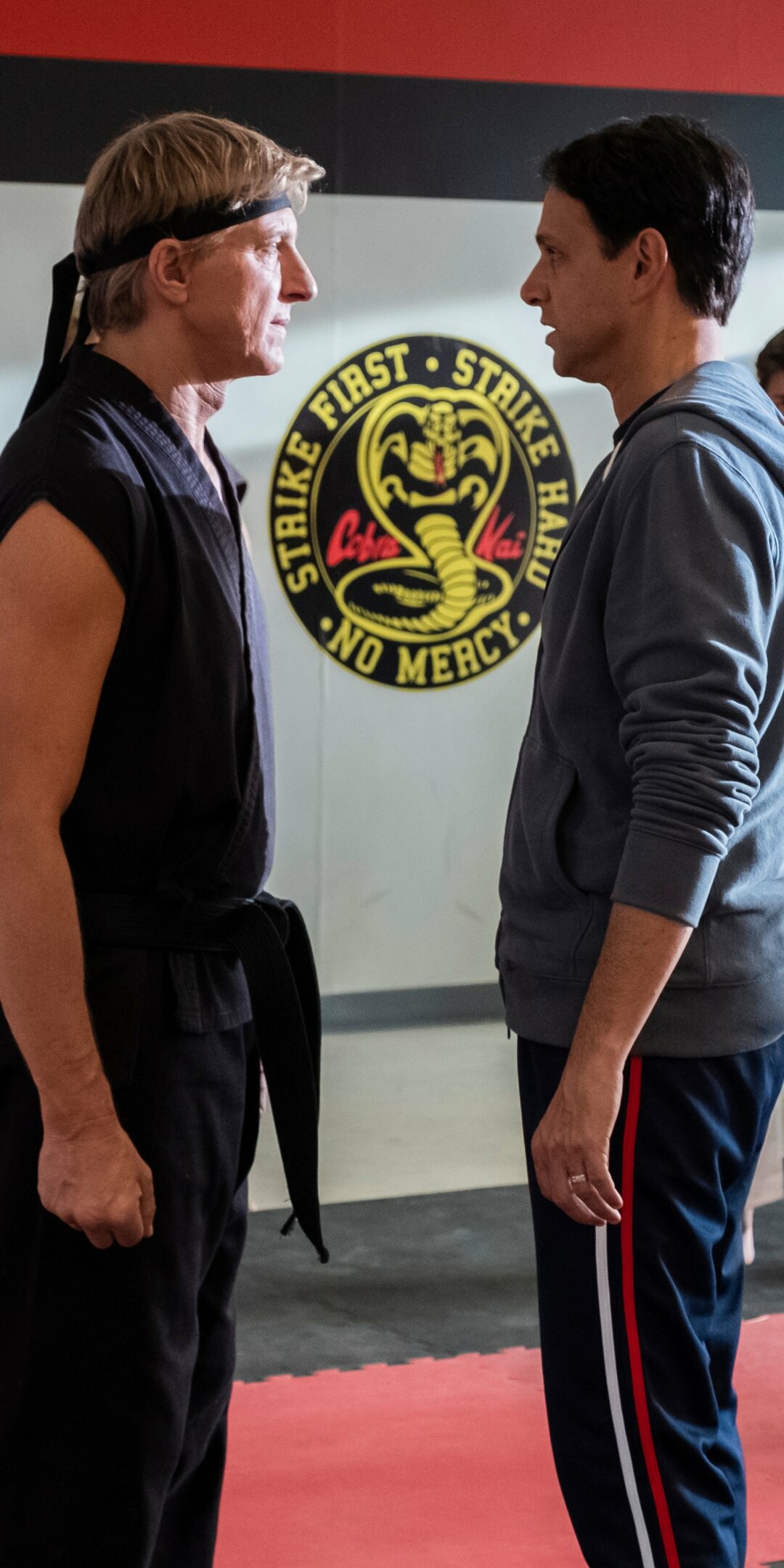 Cobra Kai (TV Series): Ralph Macchio and William Zabka reprise their roles as Daniel LaRusso and Johnny Lawrence. 1080x2160 HD Wallpaper.