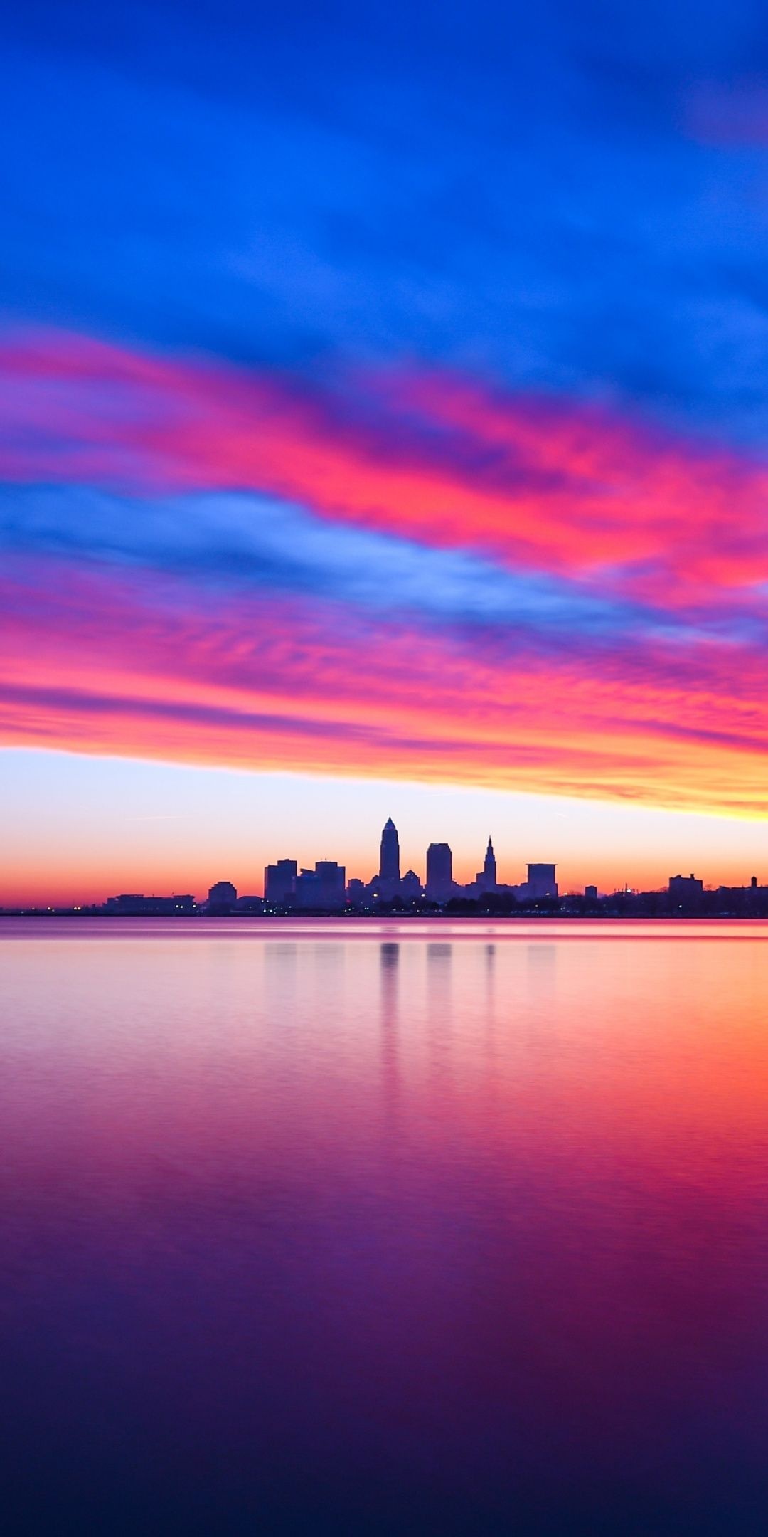 Cleveland Skyline, Colorful sunset landscape, Reflecting sky beauty, Captivating wallpapers, 1080x2160 HD Phone