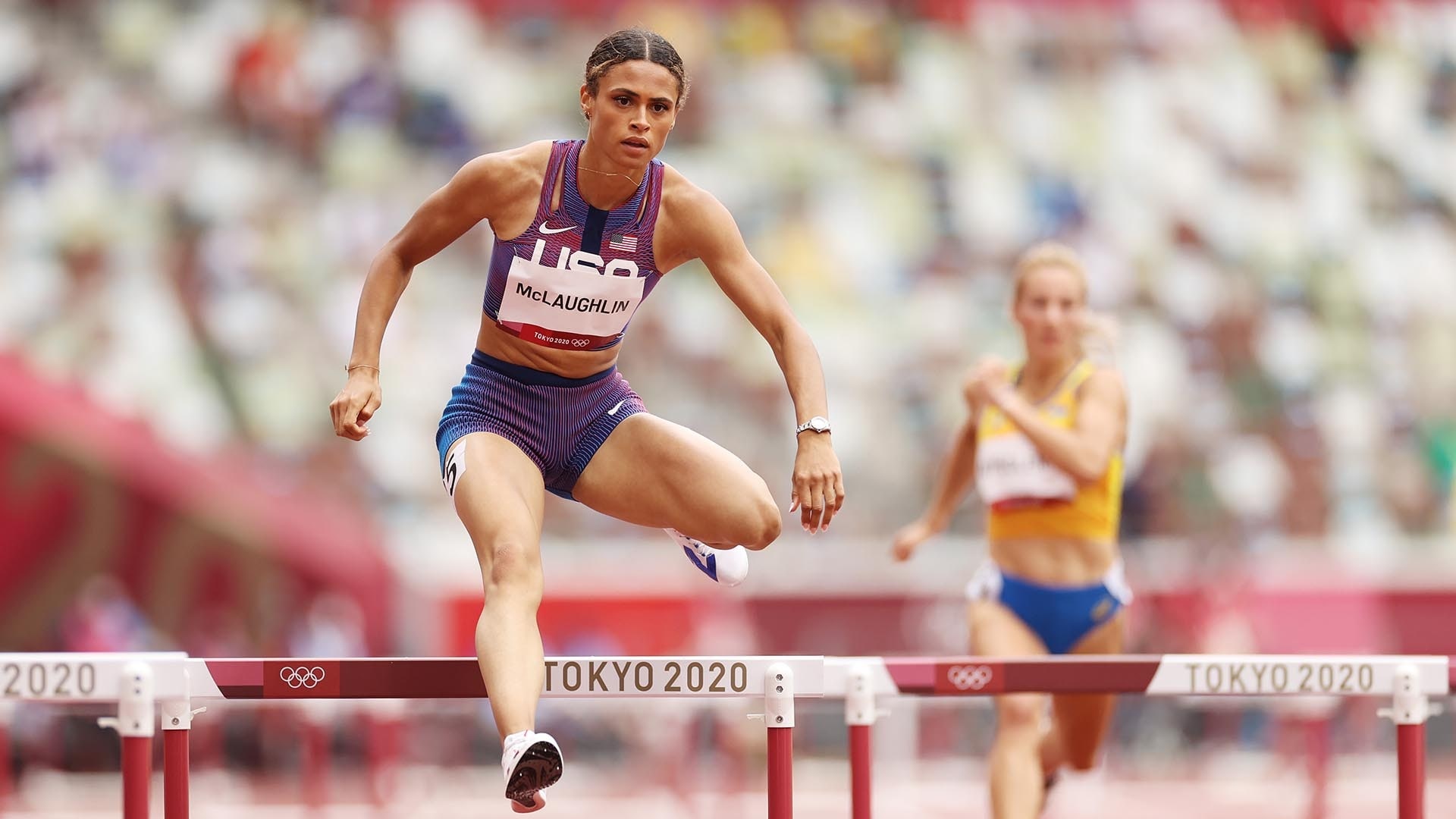 Hurdling: 400m hurdles heat, Tokyo 2020 Summer Olympics, Sydney McLaughlin, Hurdle race. 1920x1080 Full HD Background.
