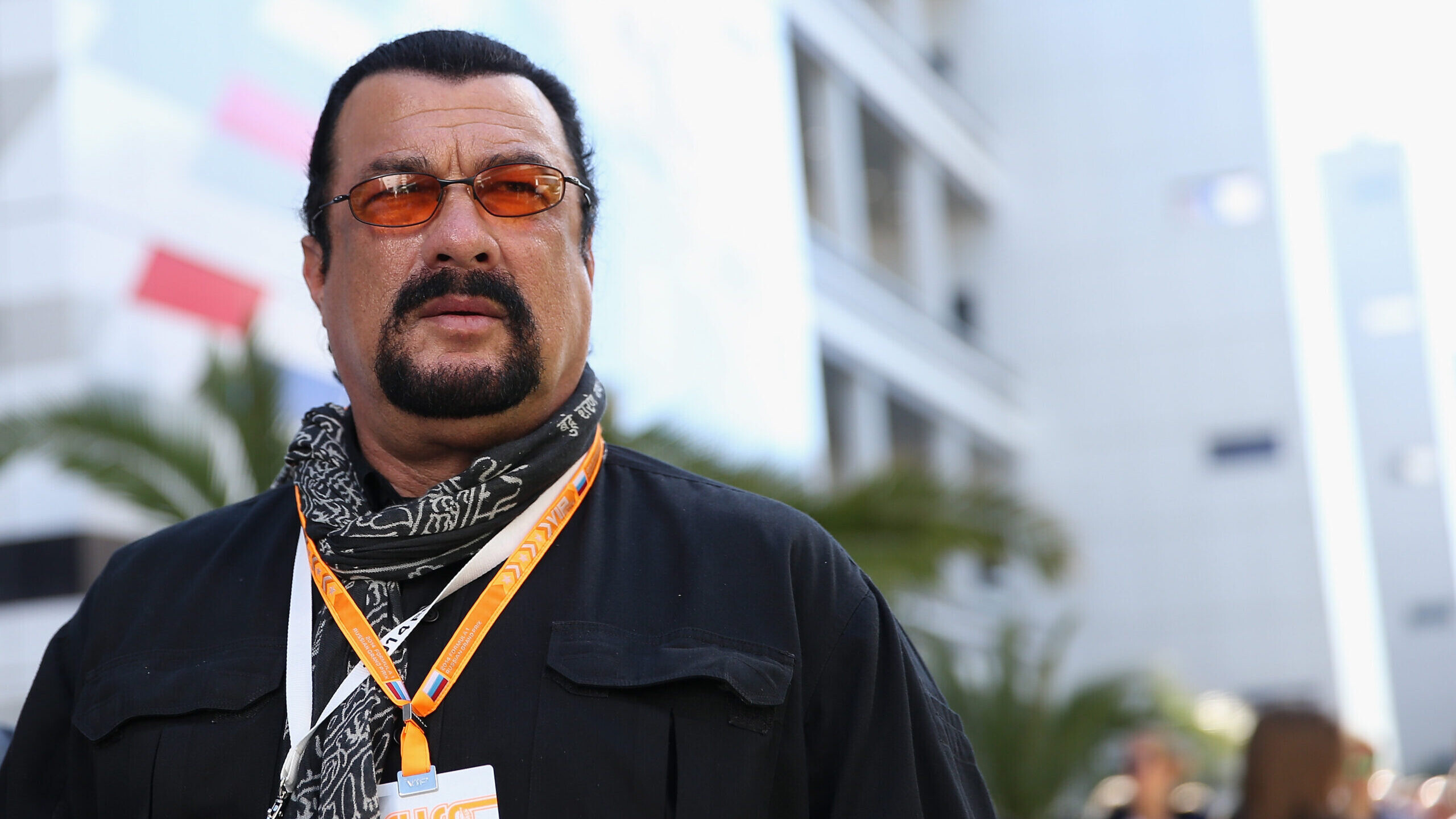 Steven Seagal: An American actor, film producer, screenwriter, martial artist, and musician, Appointed as Russian Special Envoy. 2560x1440 HD Background.