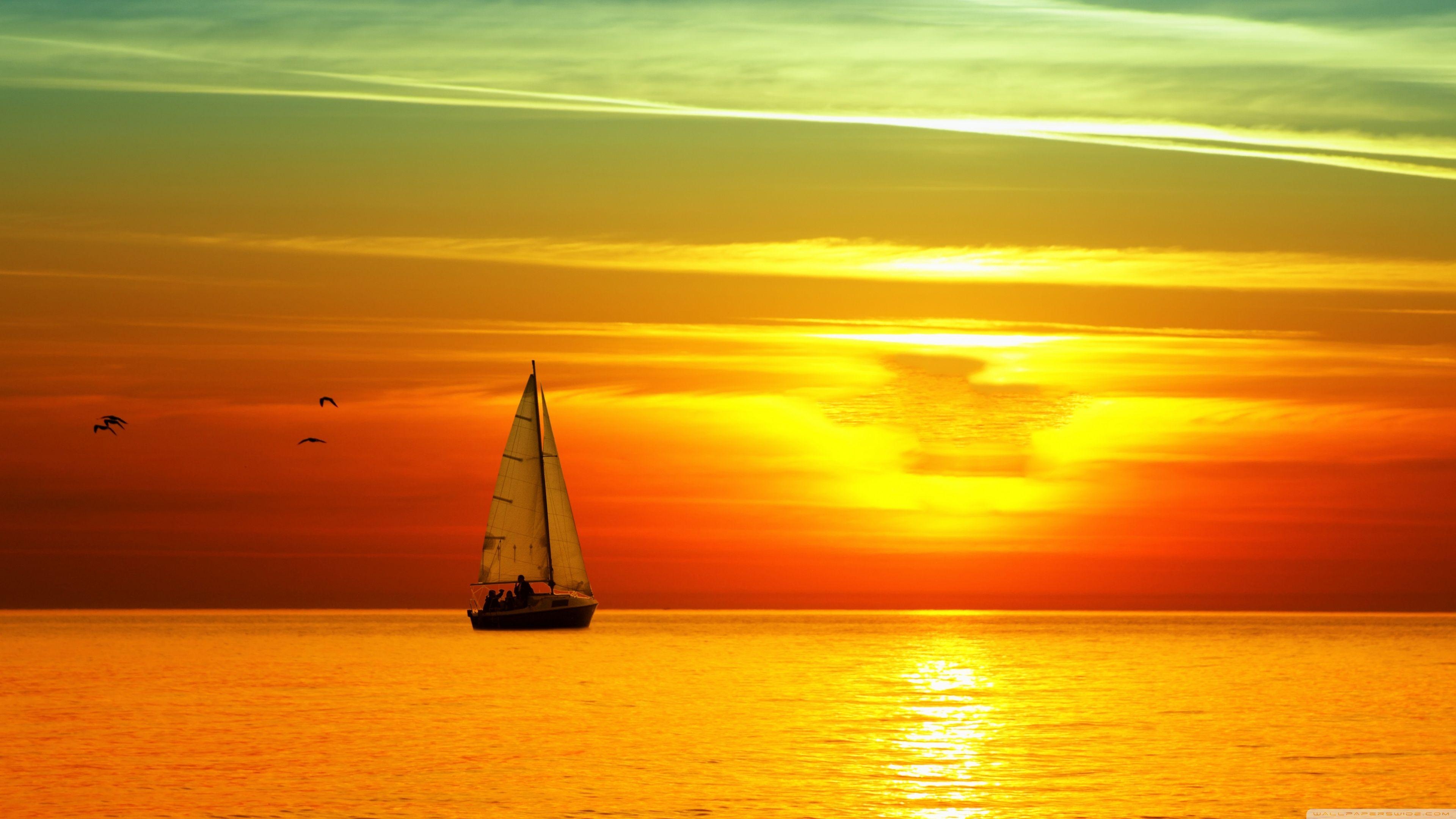 Sailing: Sunset, The activity of riding in a boat that's propelled by the wind, Yachting. 3840x2160 4K Wallpaper.