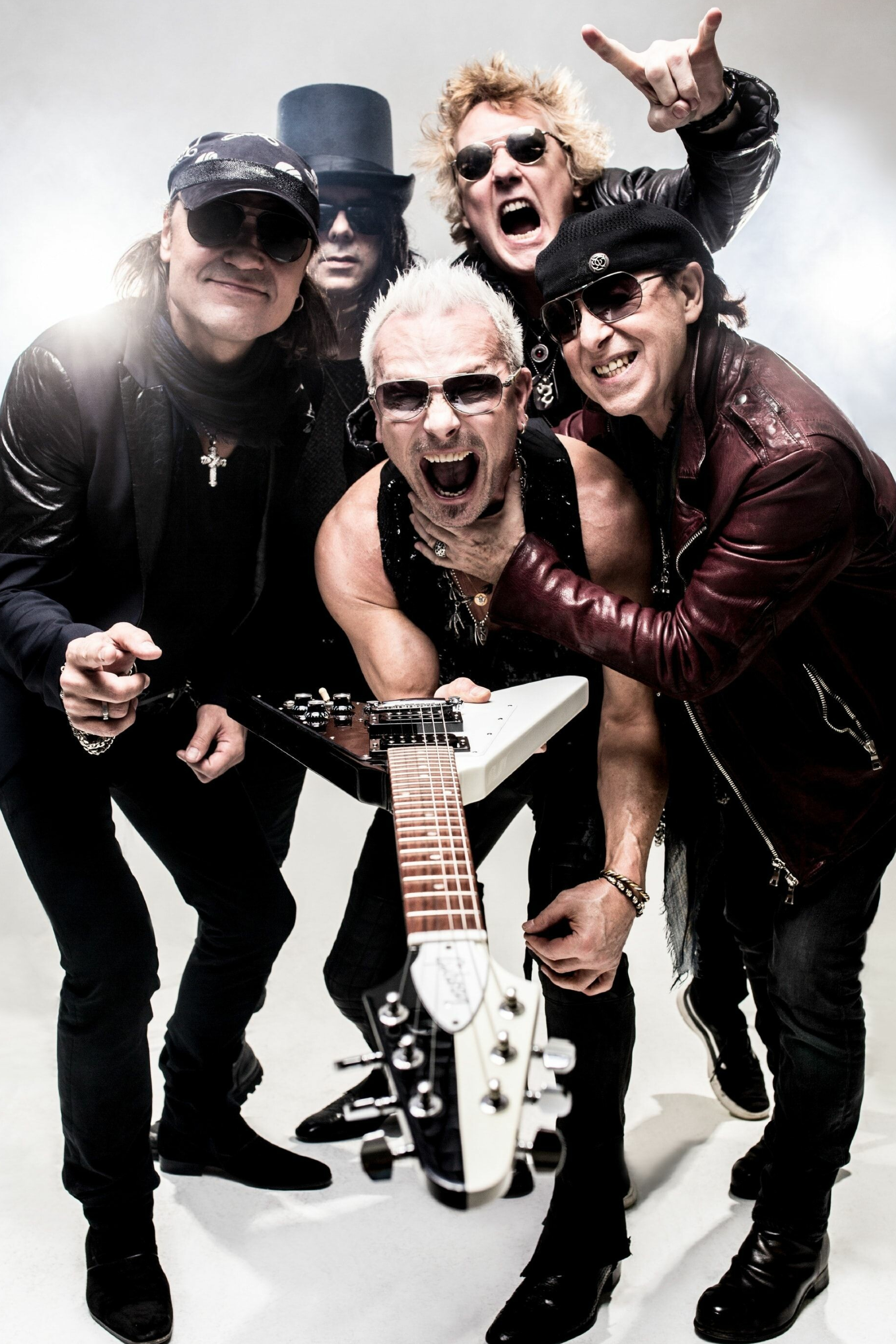 Scorpions: A German rock band formed in Hanover in 1965 by guitarist Rudolf Schenker. 2050x3080 HD Background.