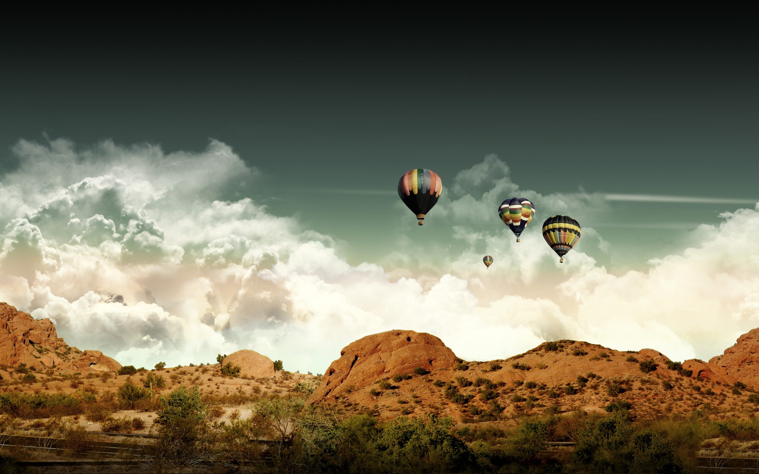 Air Sports: Floating Vehicles drifting over the mountain range in clouds, Aerostatic balloons. 2560x1600 HD Wallpaper.