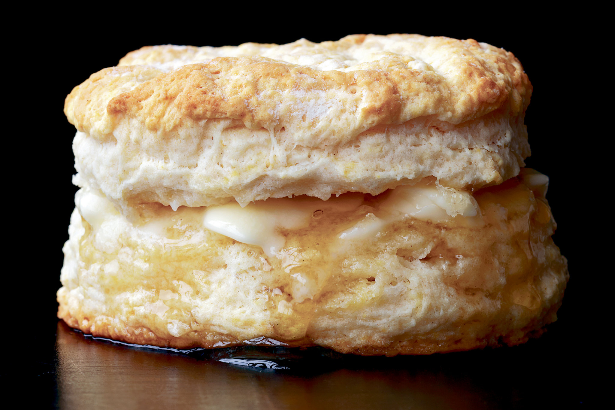 Biscuit: Buttermilk biscuits have fluffy, flaky layers and a sweet honey butter topping. 2050x1370 HD Background.