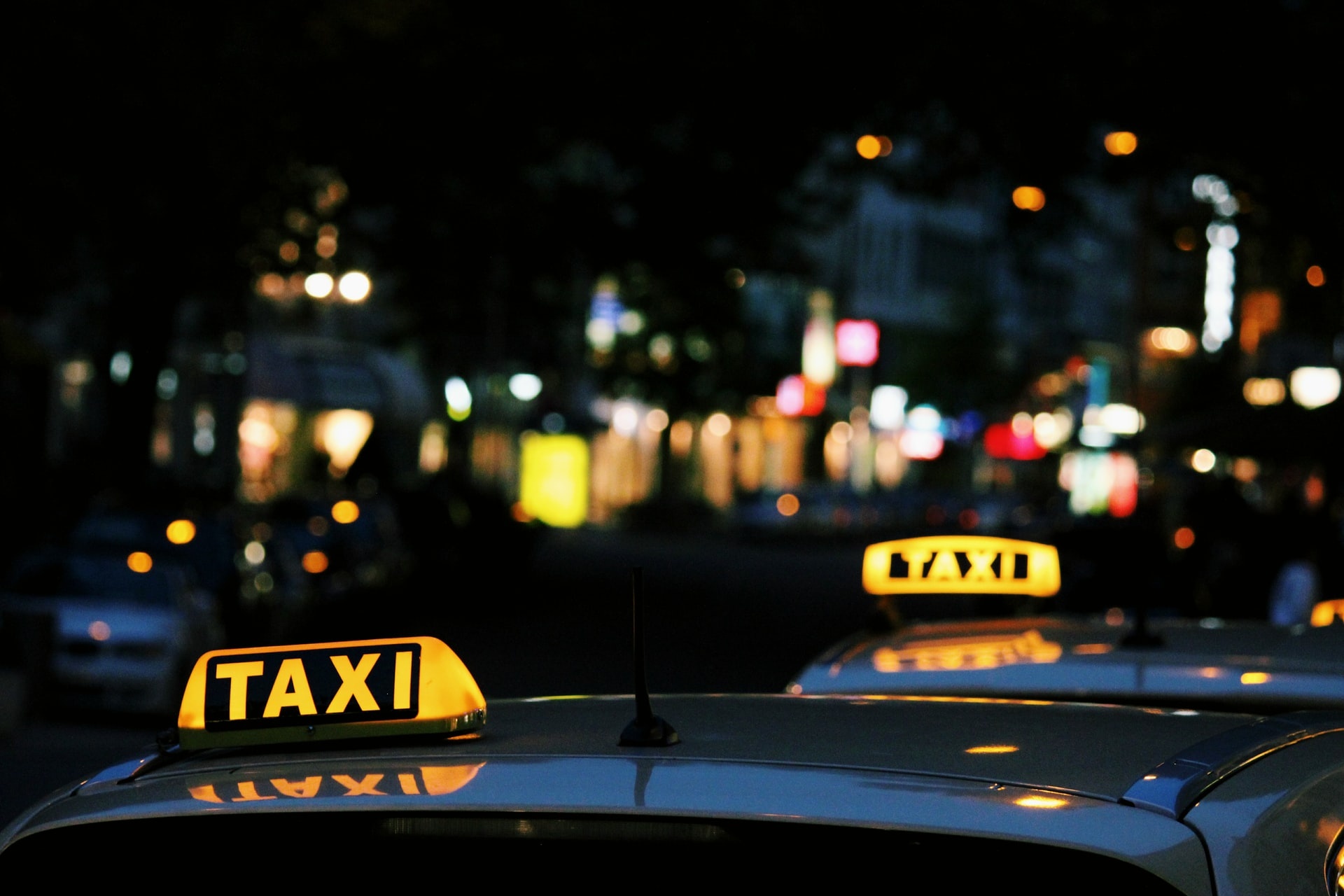 Taxi: A luminous taxicab top sign, For-hire automobile travel. 1920x1280 HD Background.