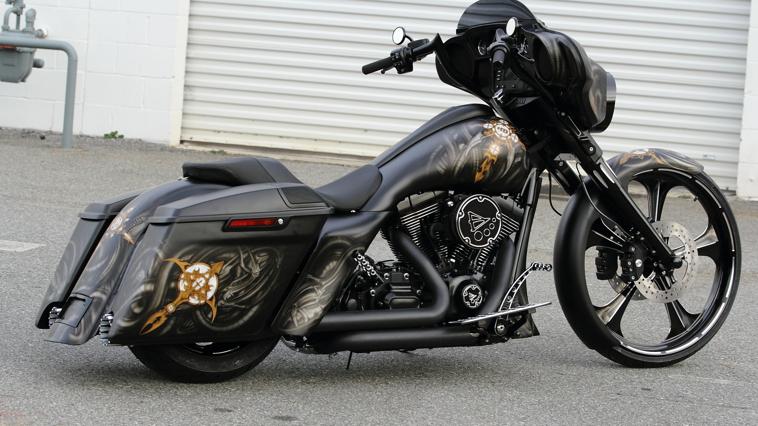 Harley-Davidson Glide: A touring model, An upright riding position and saddlebags. 2560x1440 HD Wallpaper.