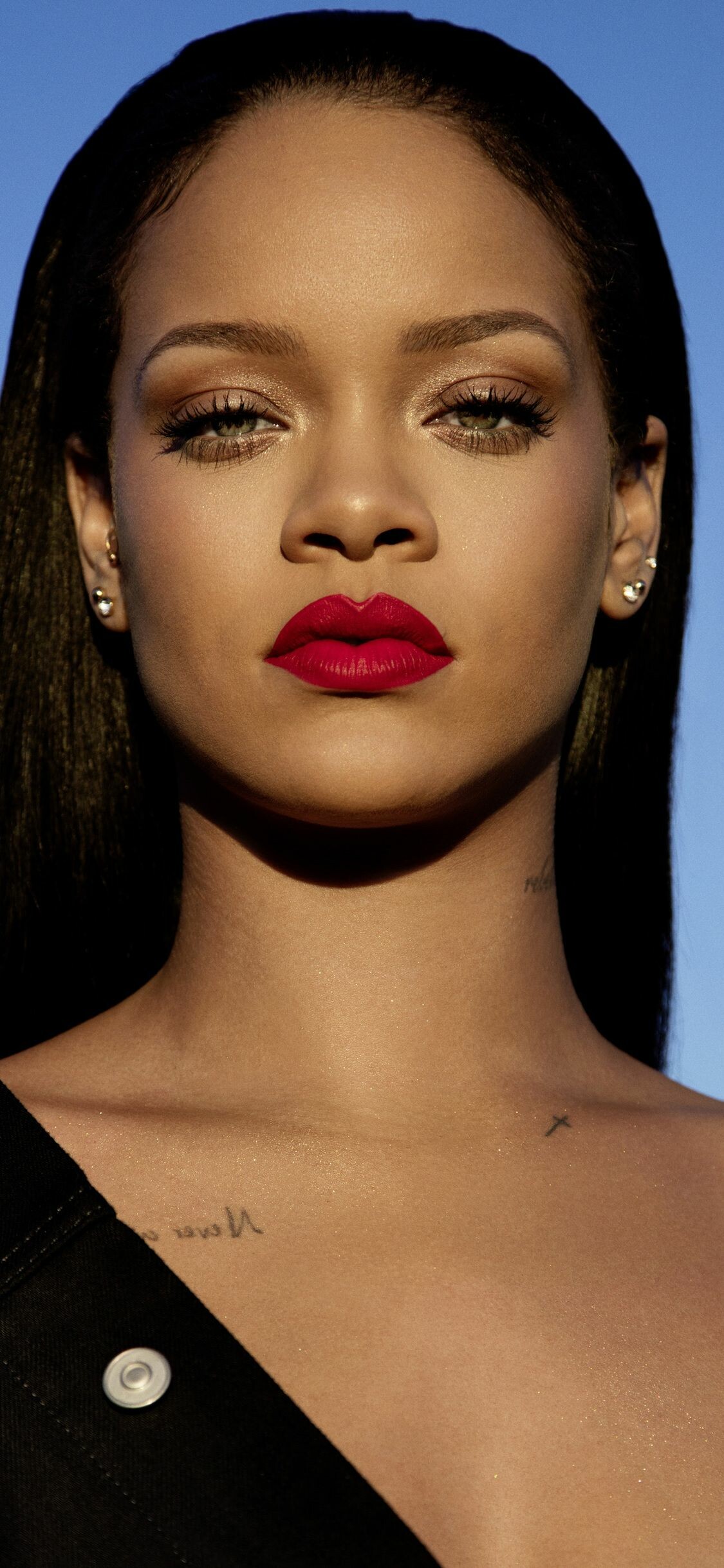 Rihanna: One of the most consistent hit makers in pop music for her chart-topping seven albums. 1130x2440 HD Background.