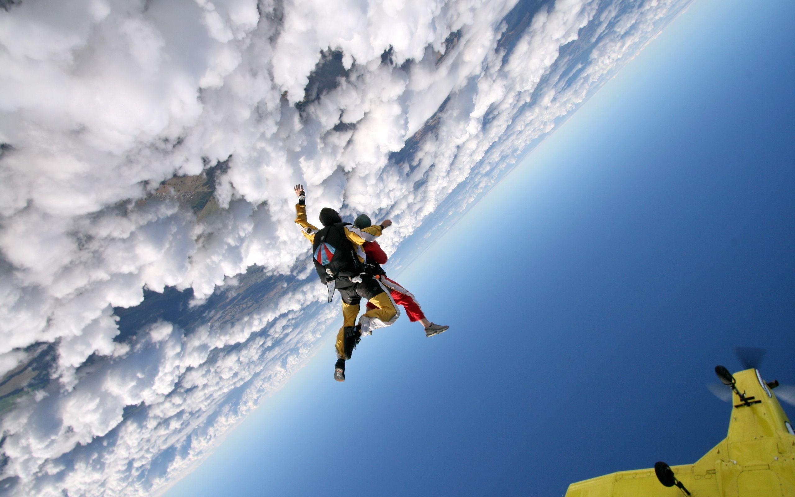 Parachuting: Free fall tandem parachute jump, Parachuting aircraft, Extreme sport. 2560x1600 HD Background.