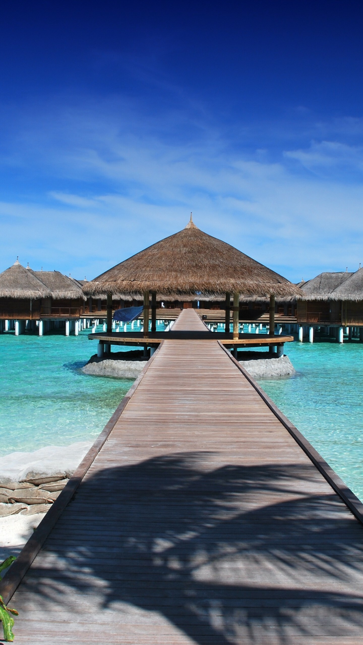 Maldives: A group of about 1,200 small coral islands, Bungalow. 1440x2560 HD Background.