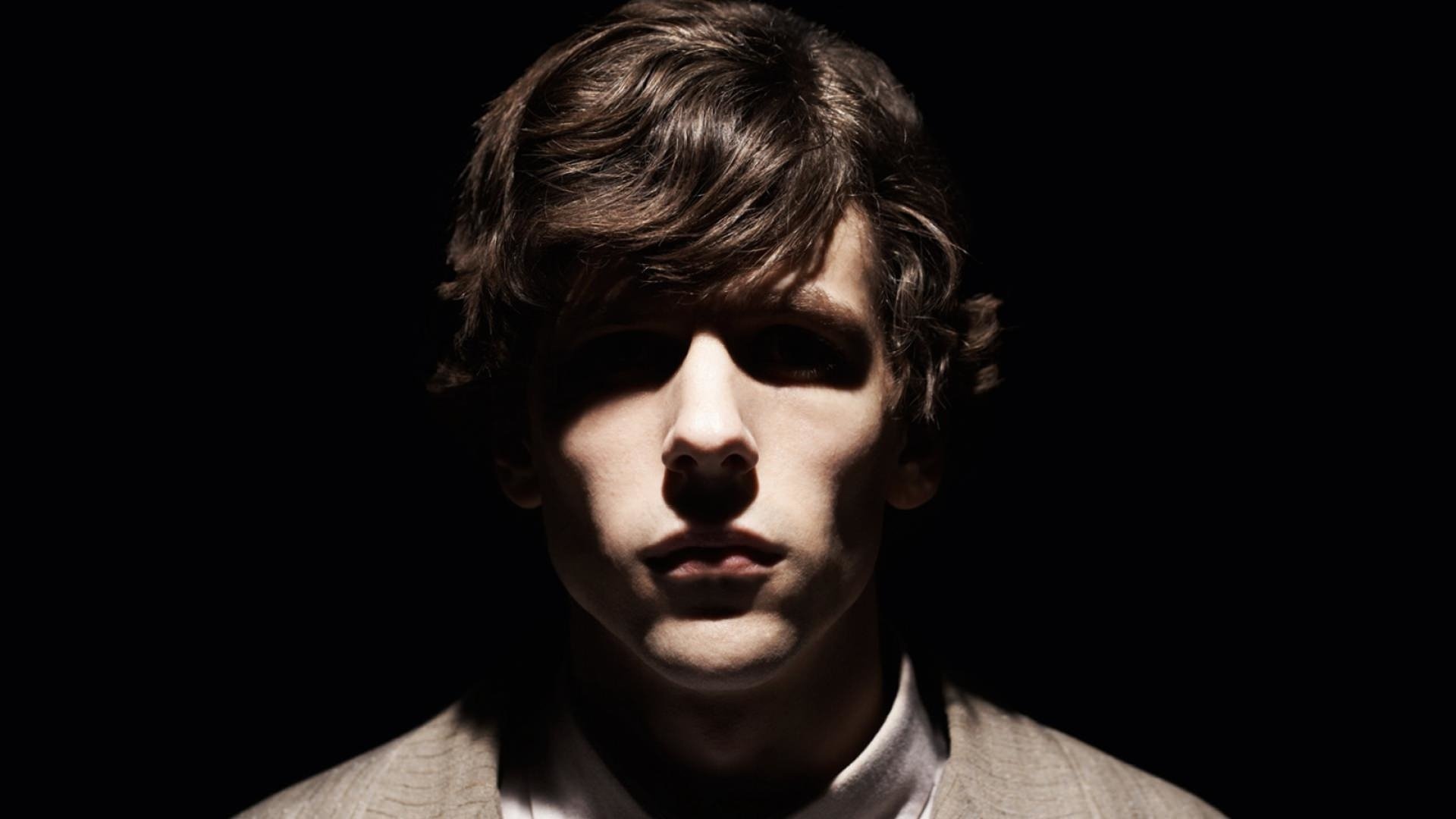 Jesse Eisenberg: Played Simon James in a 2013 British black comedy thriller film, The Double. 1920x1080 Full HD Background.