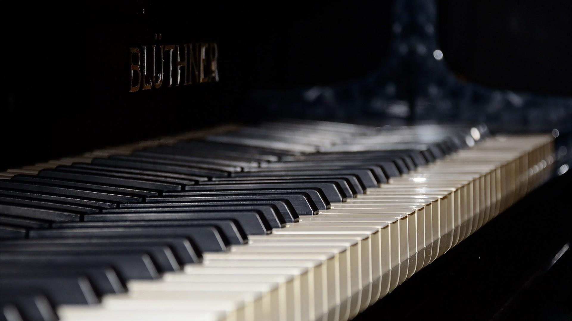 Grand Piano: Bluthner, Musical instrument with metal strings, which are strung under great tension on a heavy metal frame. 1920x1080 Full HD Background.