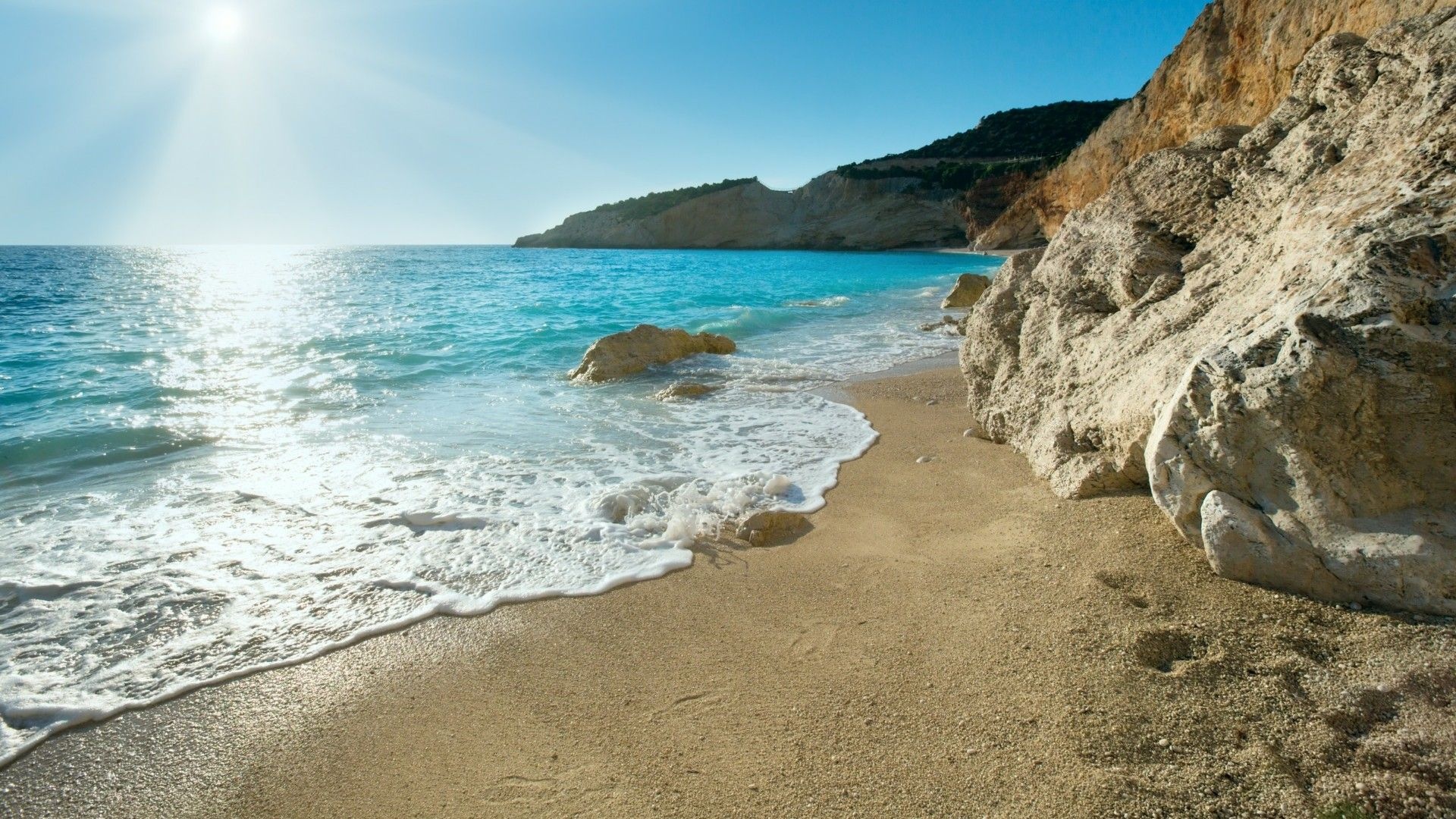 Seascape: Porto Katsiki, A beach on the Ionian island of Lefkada, Greece, A concave pale cliff, Clear blue sea. 1920x1080 Full HD Wallpaper.