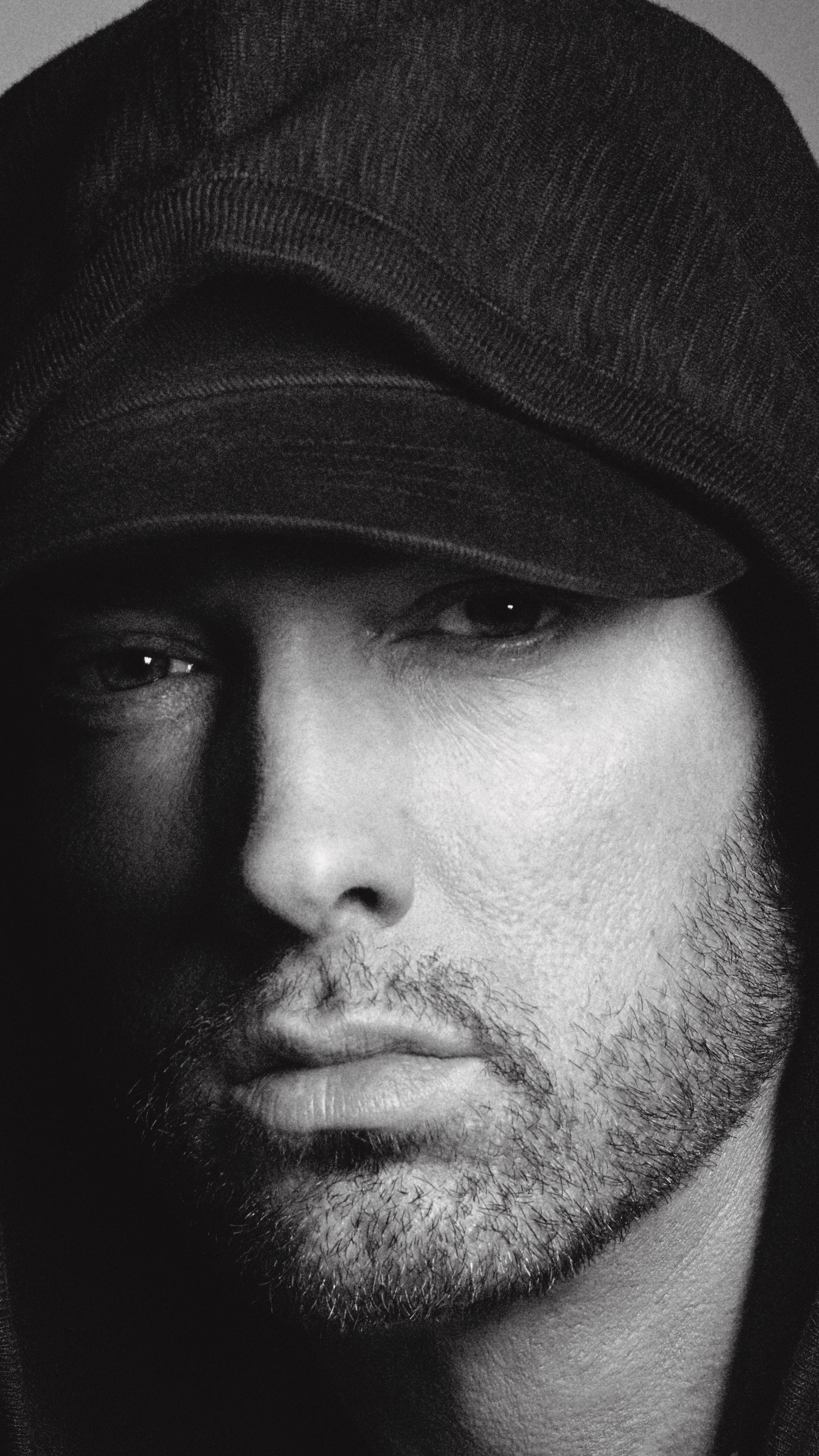 Eminem: Broke racial barriers for the acceptance of white rappers in popular music. 2160x3840 4K Background.