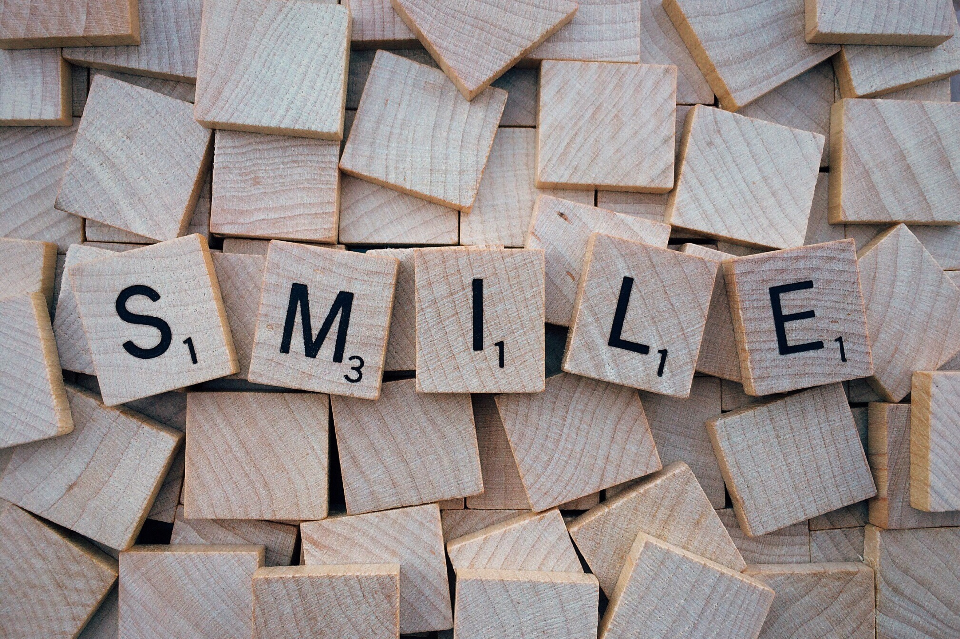 Scrabble: Smile, Motivation through a popular board game, Wooden dices. 3130x2080 HD Background.