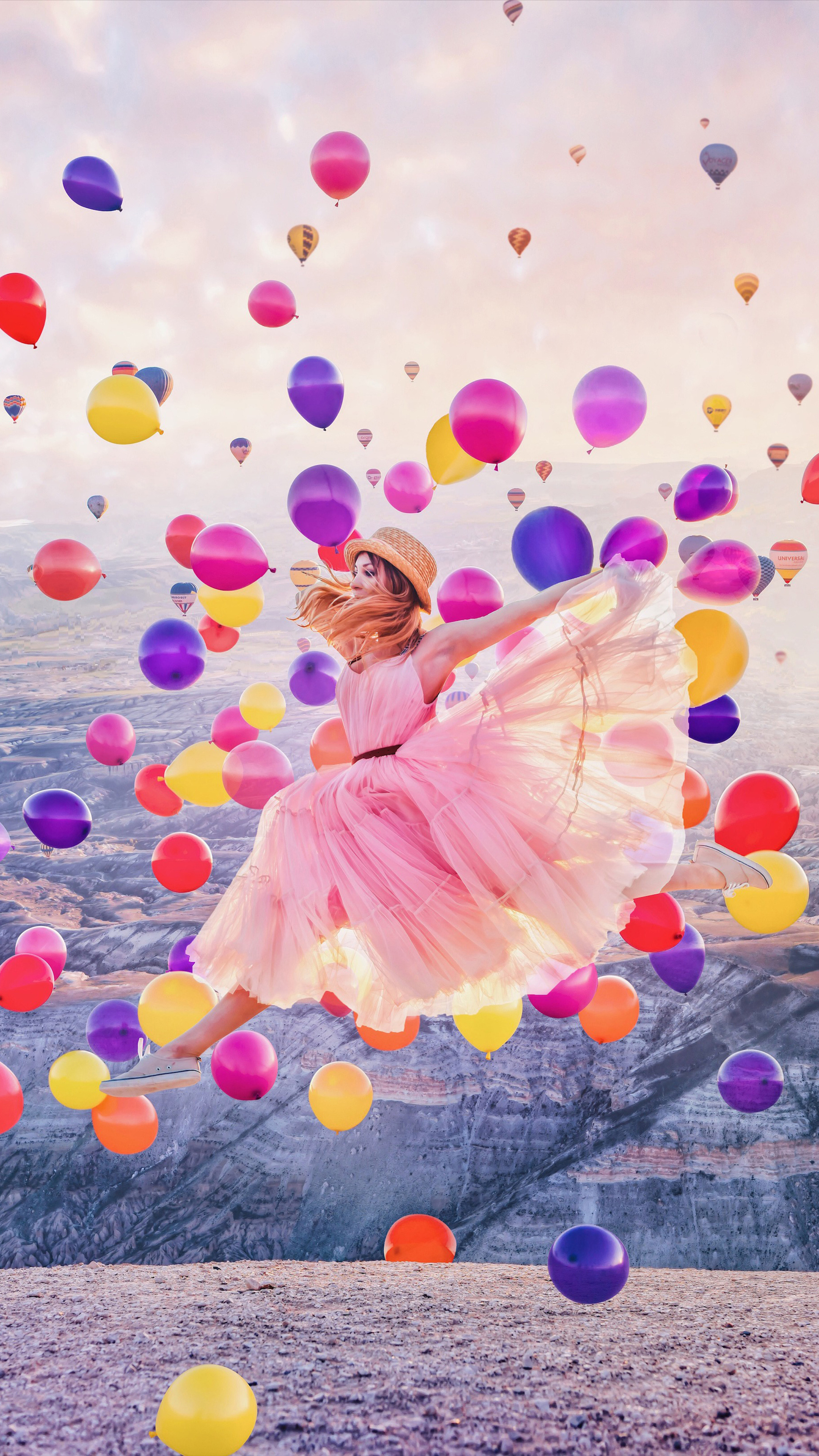 Jumping: Leaping in Mountains and Balloons. 2160x3840 4K Background.