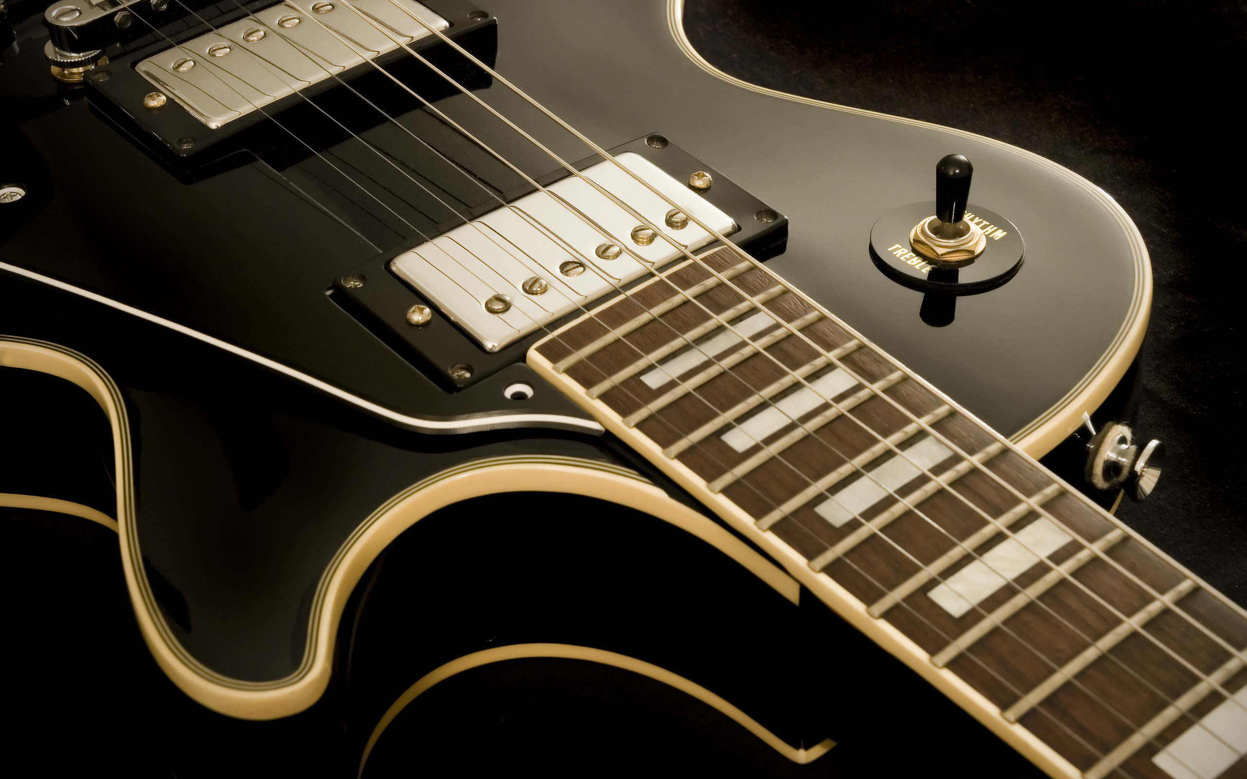 Guitar: A musical instrument with a flat-backed rounded body that narrows in the middle. 2560x1600 HD Wallpaper.