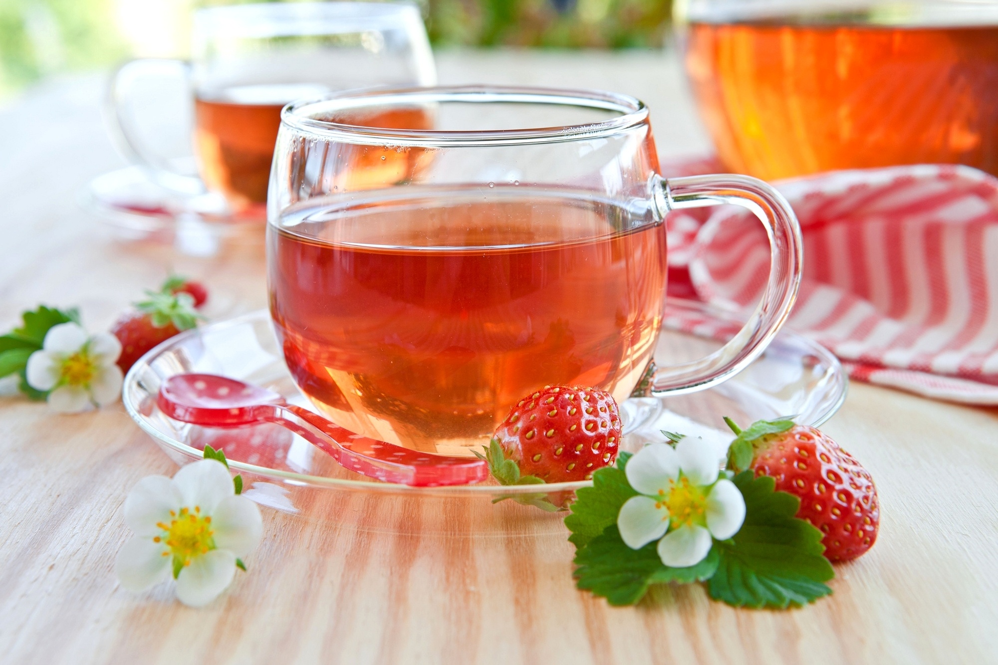 Refreshing strawberry drinks, Tea served creatively, Vibrant cup imagery, Summery beverage, 2000x1340 HD Desktop