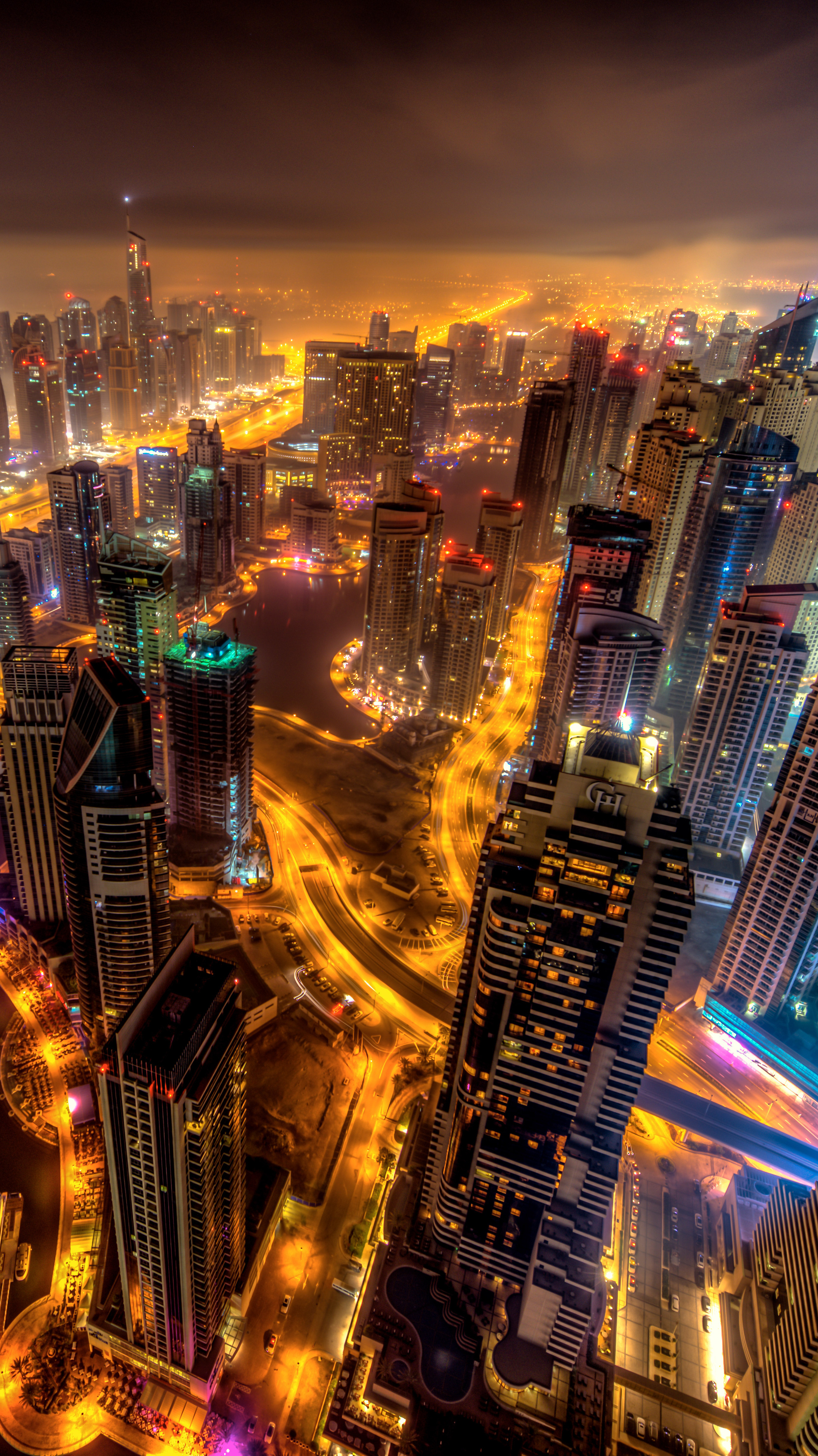 Dubai: The city center, A string of skyscrapers lining Sheikh Zayed Road, Night lights. 2160x3840 4K Wallpaper.