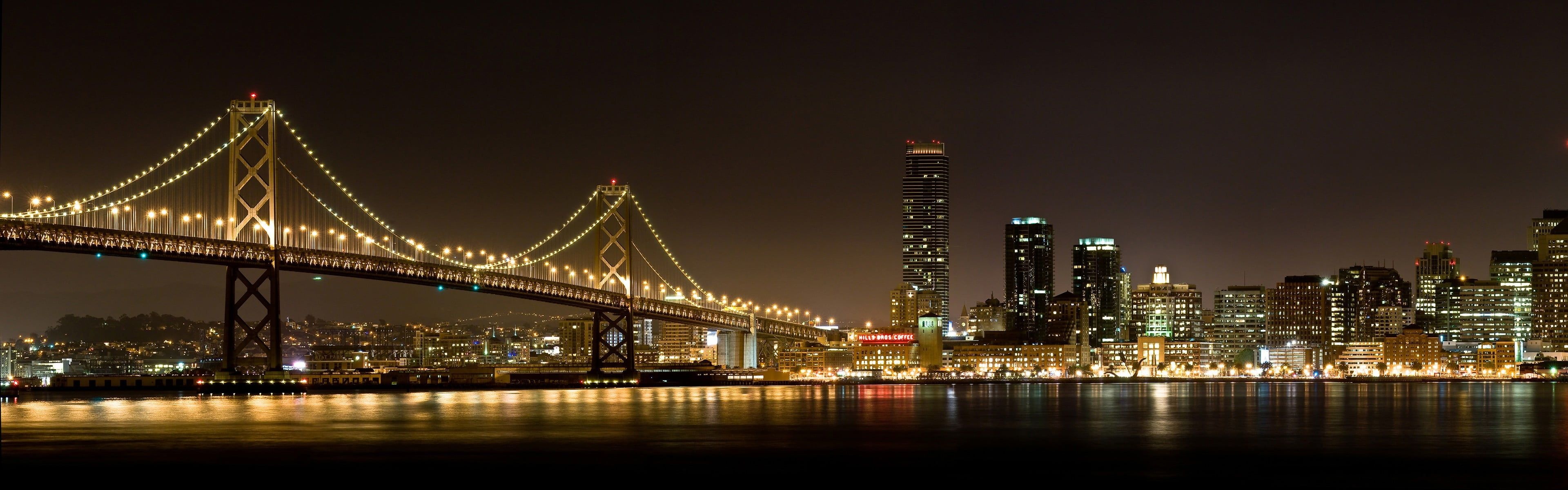 Bridge: The Brooklyn Span, The southernmost of the four toll-free vehicular spans connecting Manhattan and Long Island. 3840x1200 Dual Screen Wallpaper.