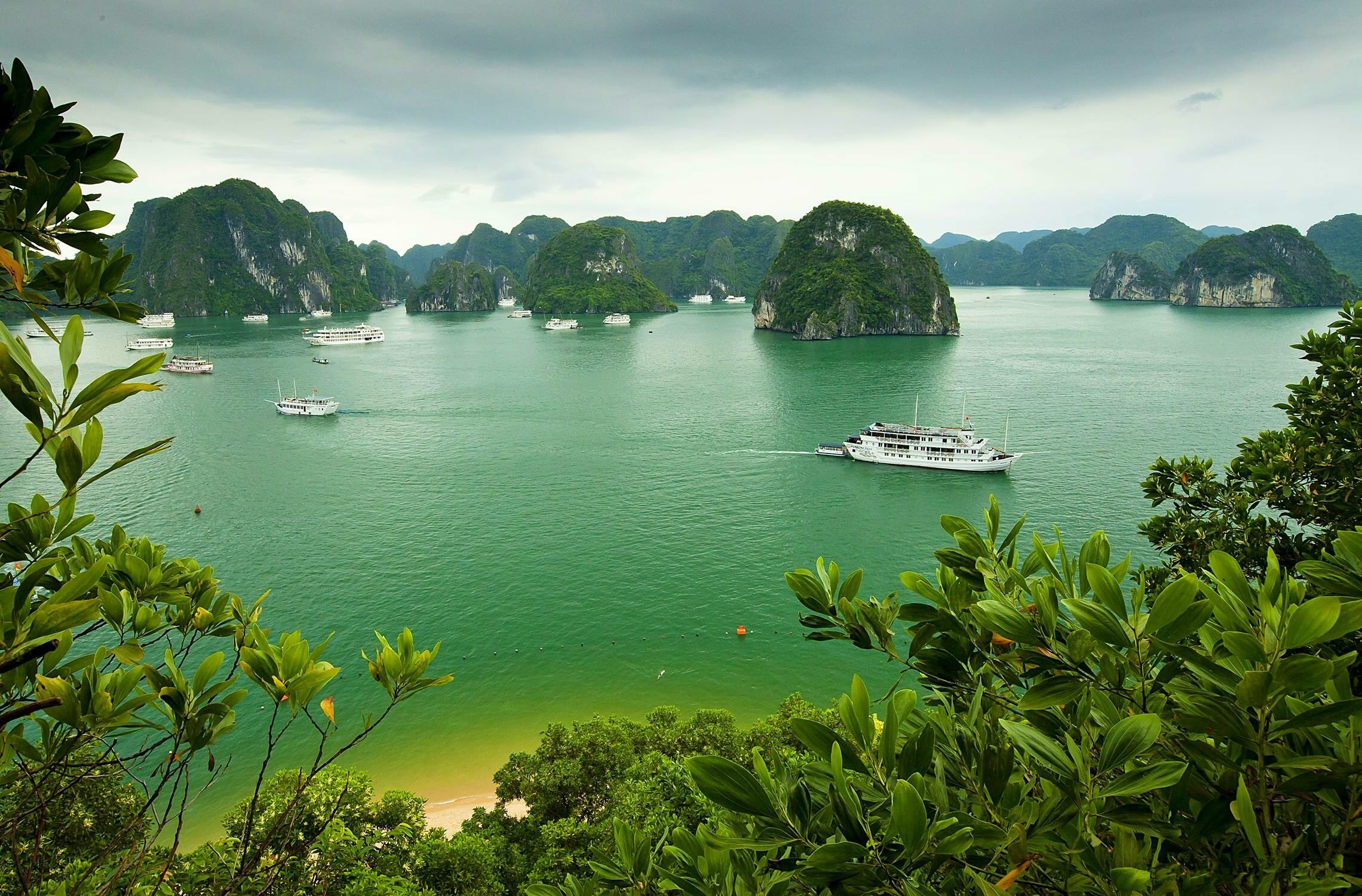 Halong Bay, Vietnam, Picturesque island, Serene boat, Magical scenery, 2280x1500 HD Desktop
