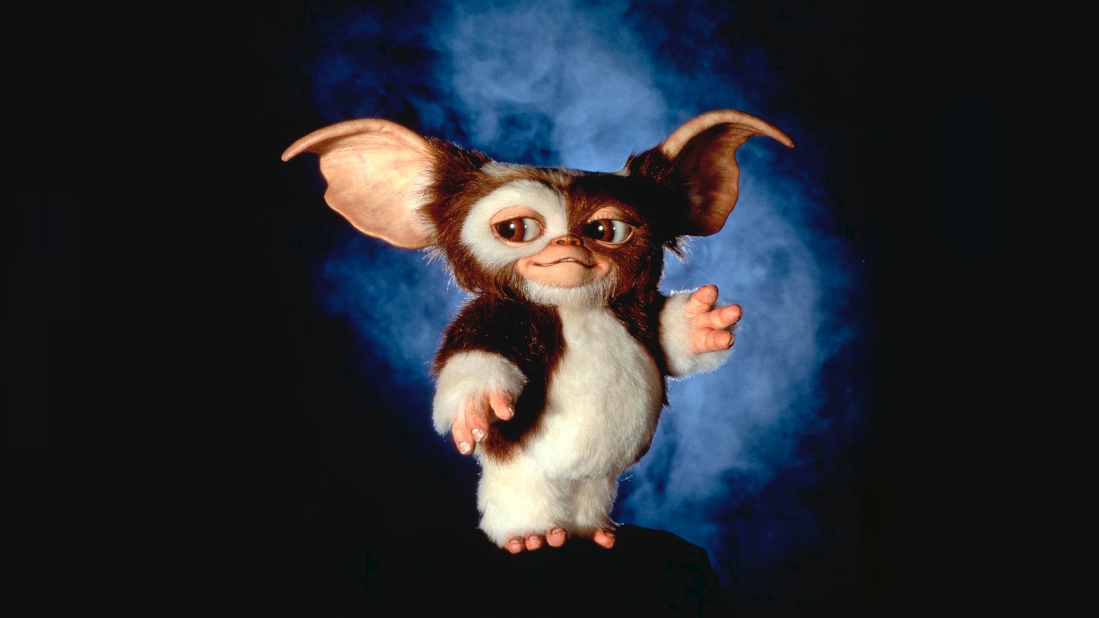 Gremlin Gizmo: Giz, An adorable, very kind Mogwai who is part of Billy Peltzer’s life. 3840x2160 4K Background.