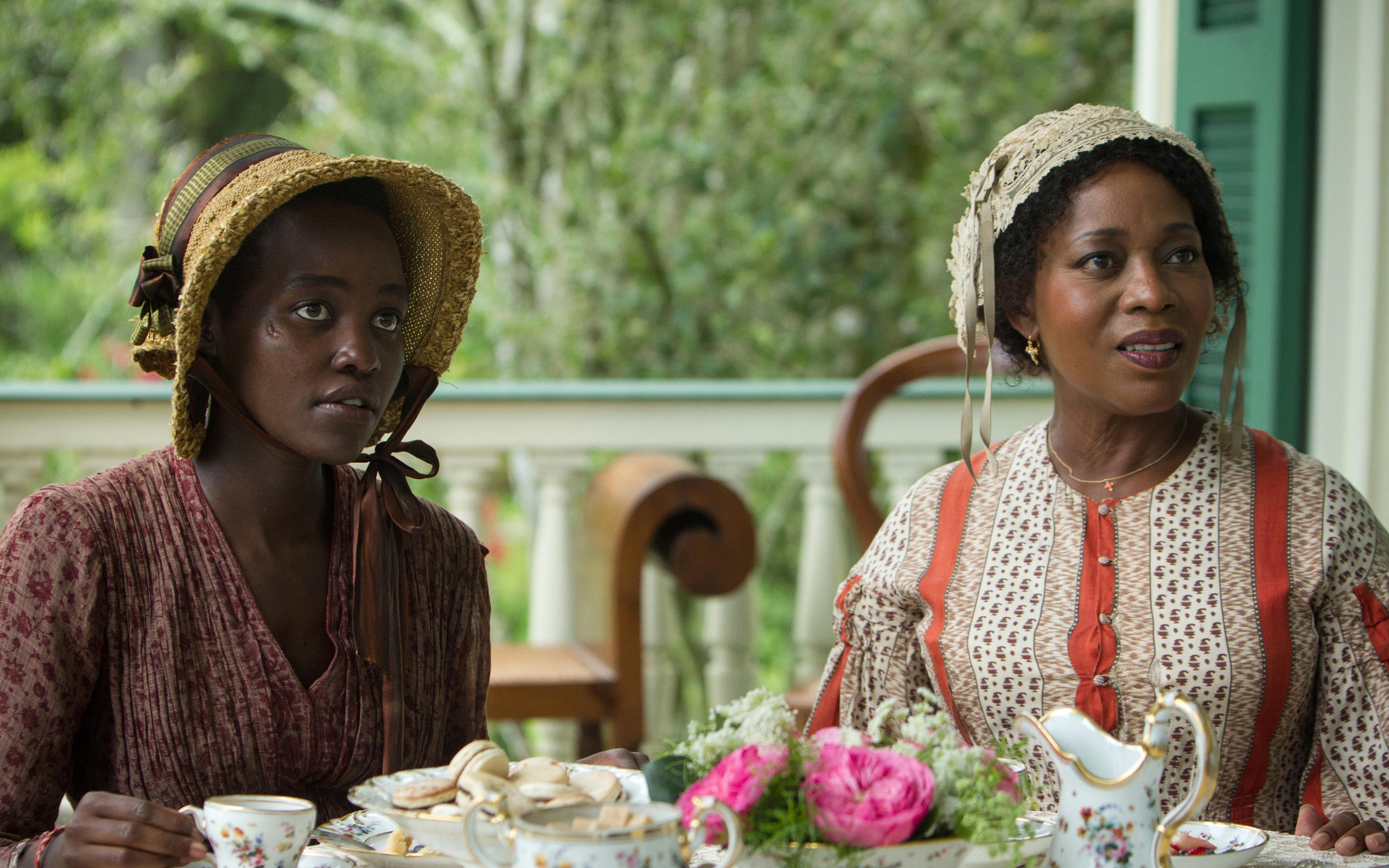 12 Years A Slave: Alfre Woodard as Mistress Harriet Shaw, Lupita Nyong'o as Patsey. 2560x1600 HD Wallpaper.